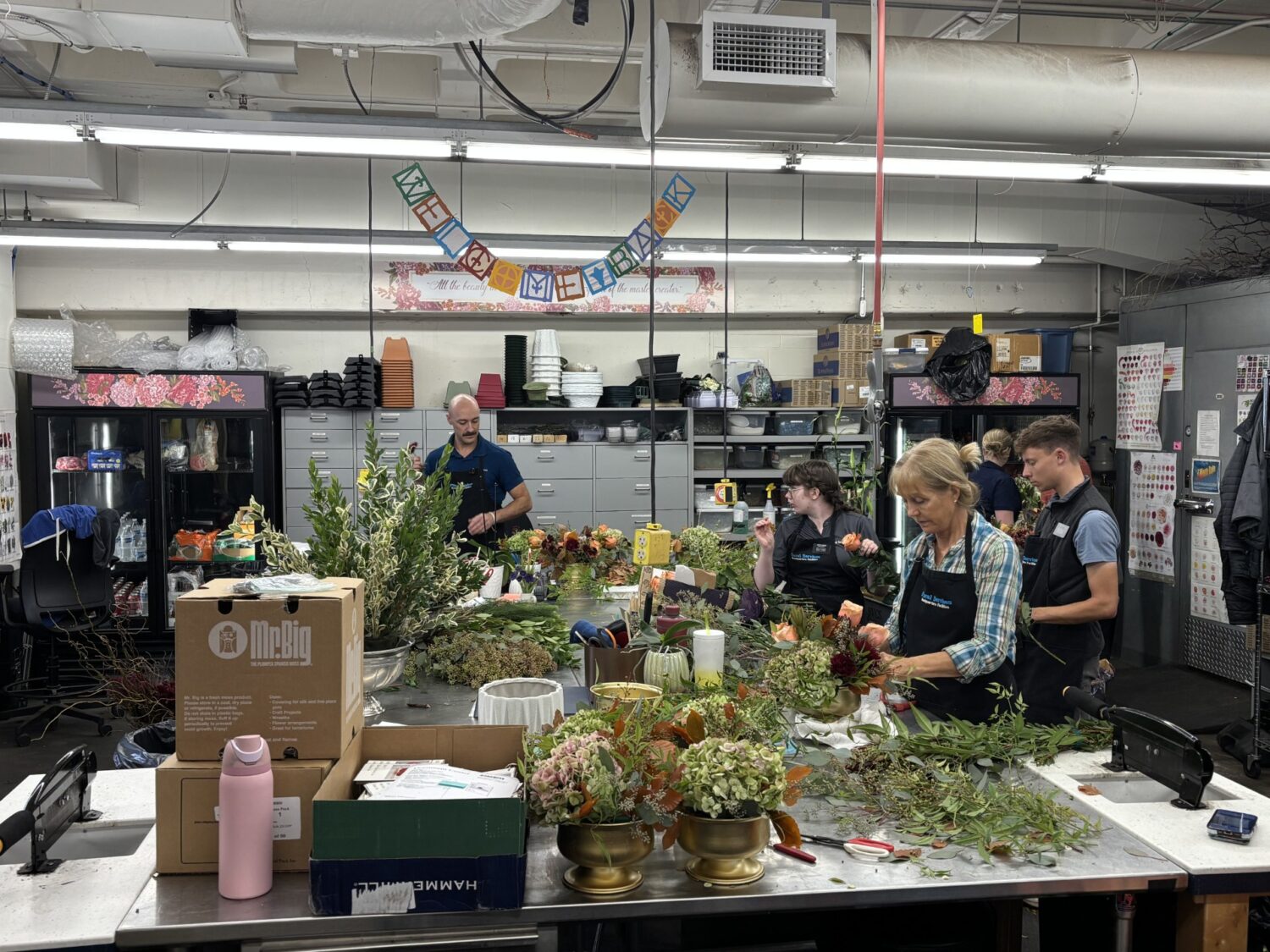 The church floral department creates floral arrangements for general conference, Thursday. The flowers are selected from Ensign Wholesale Flower Market on the Monday before conference.
