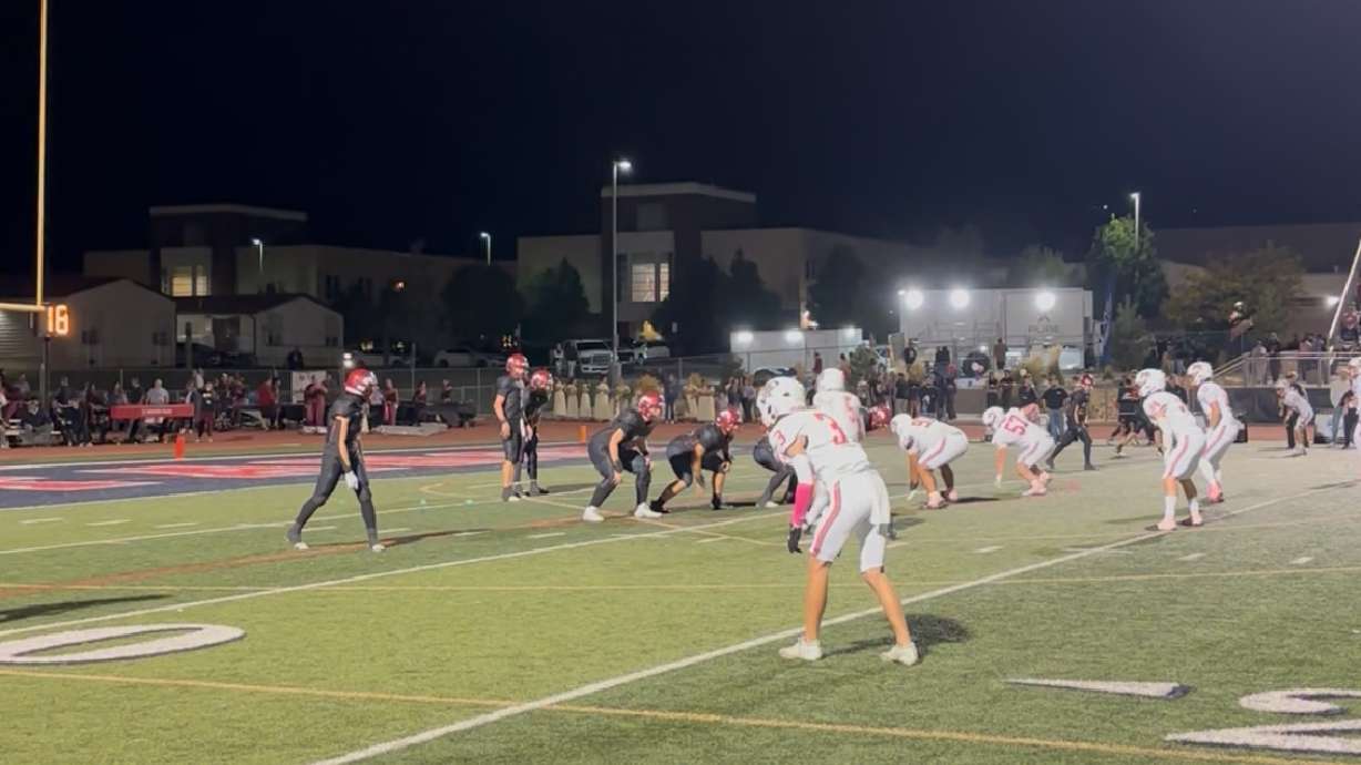 Herriman's offense lines up against Mountain Ridge.