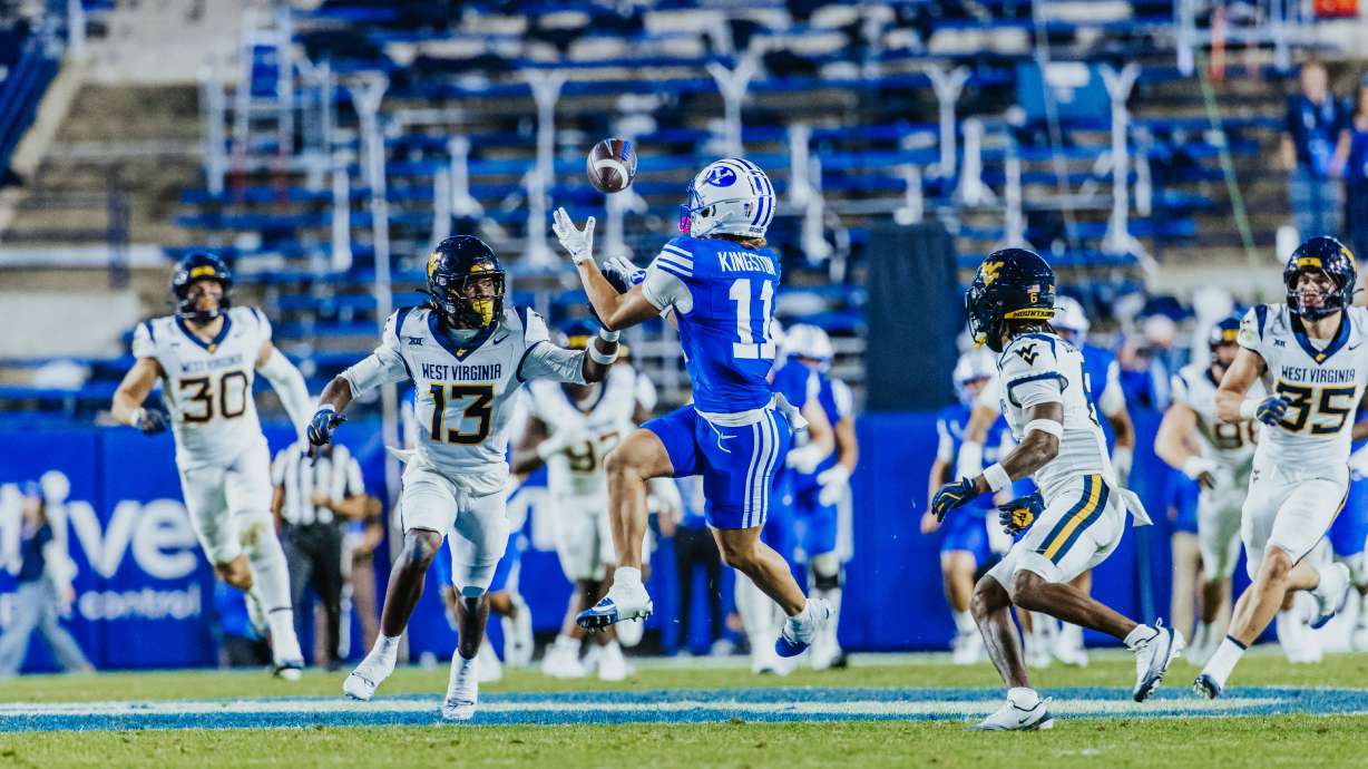 BYU's Parker Kingston catches a pass from quarterback Bear Bachmeier during the second half of a 38-14 win over West Virginia, Friday, Oct. 3, 2025 at LaVell Edwards Stadium in Provo, Utah.