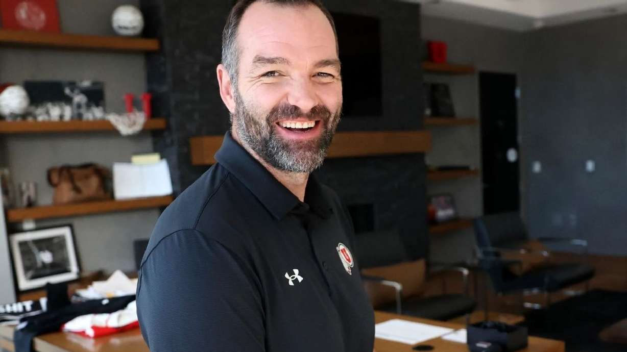 University of Utah men’s basketball head coach Alex Jensen poses for a portrait in his office in the Jon M. and Karen Huntsman Basketball Facility in Salt Lake City on Wednesday.