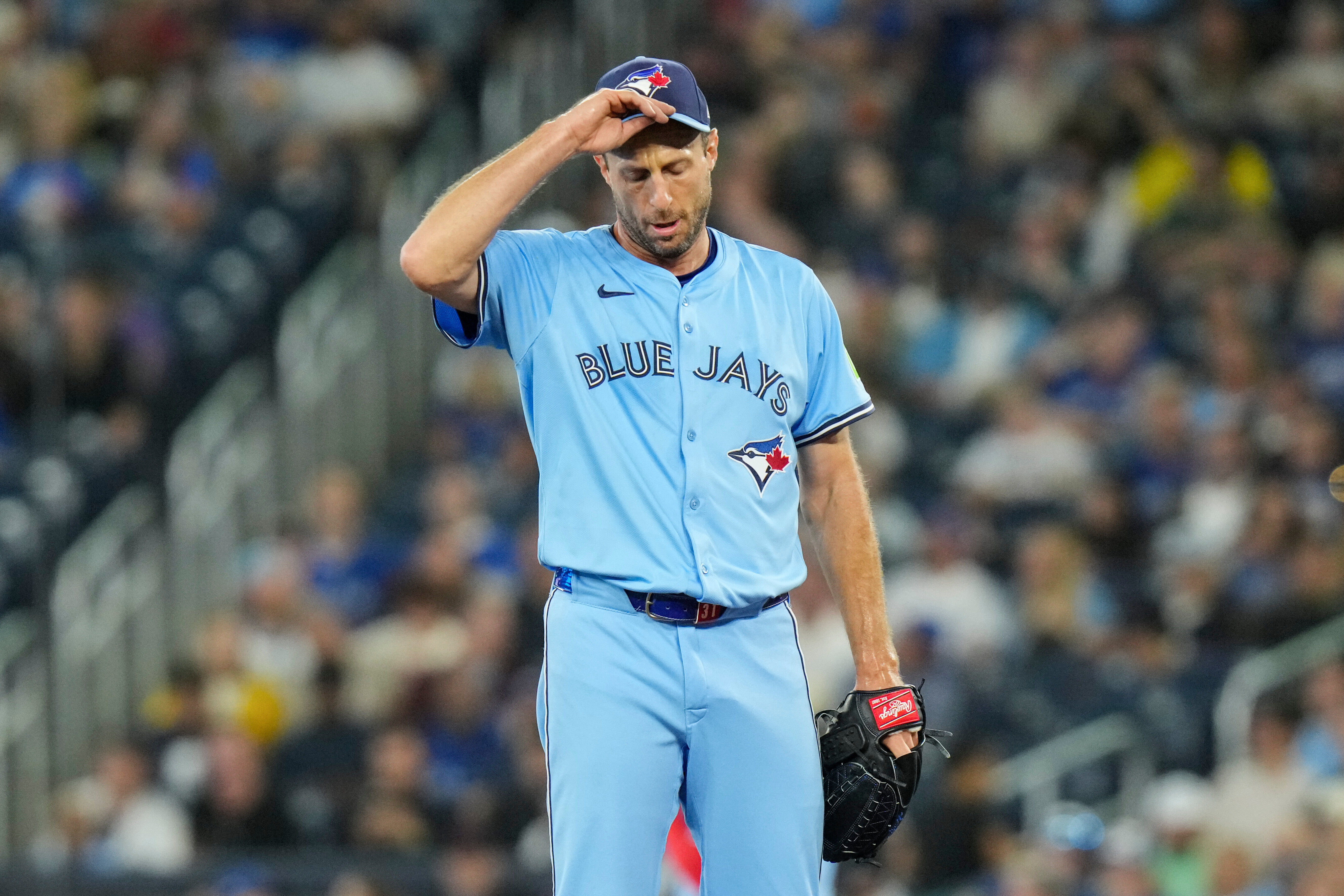 Toronto Blue Jays pitcher Max Scherzer (31) reacts as he works against the Boston Red Sox during first inning MLB baseball action in Toronto on Wednesday, Sept. 24, 2025. 