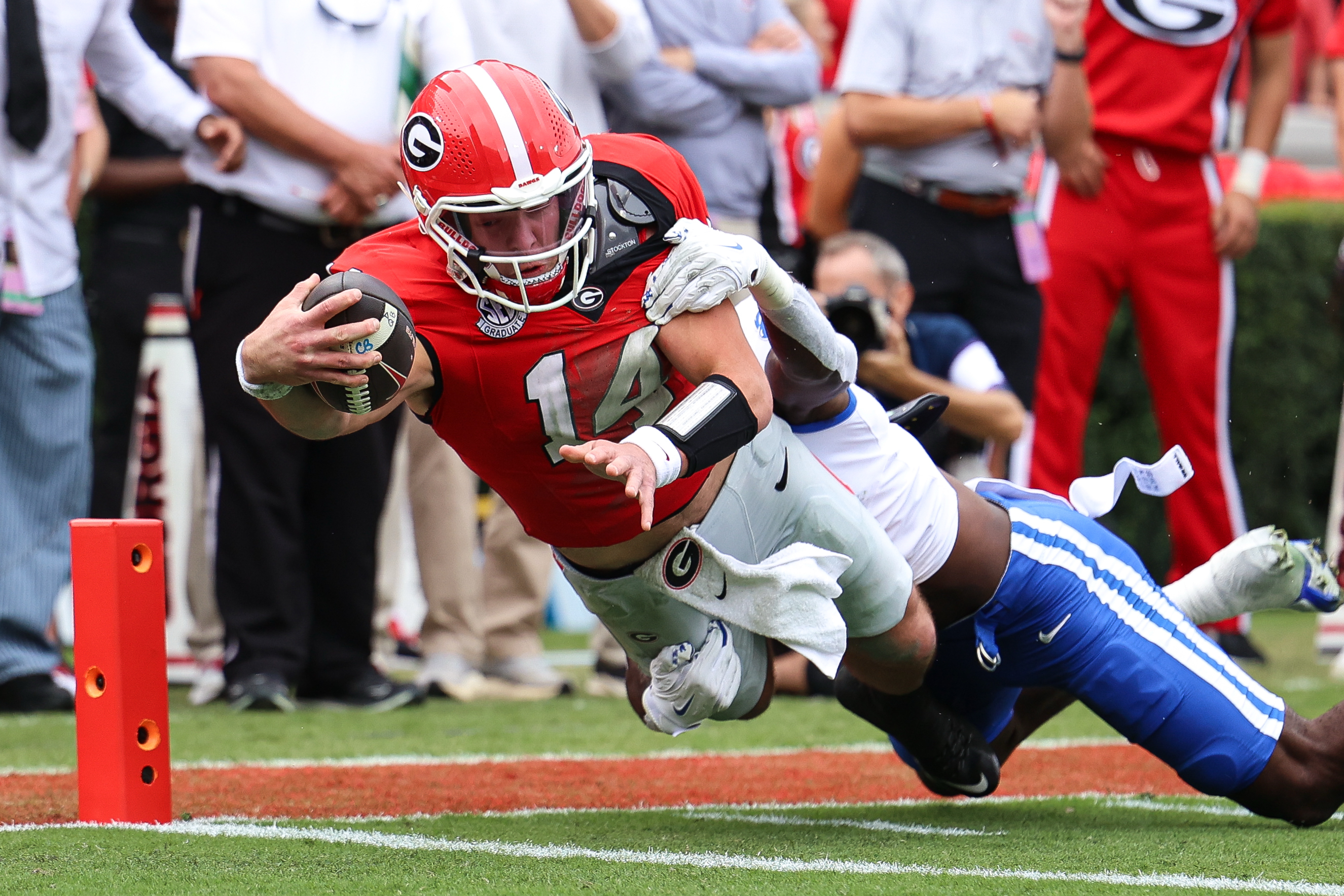 Georgia quarterback Gunner Stockton (14) dives in for a touchdown during the first half of an NCAA college football game against Kentucky, Saturday, Oct. 4, 2025, in Athens, Ga. 