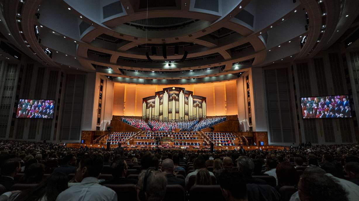 A combined institute choir from Ogden and South Jordan sings during the afternoon session of the 195th Semiannual General Conference of The Church of Jesus Christ of Latter-day Saints at the Conference Center in Salt Lake City on Saturday.
