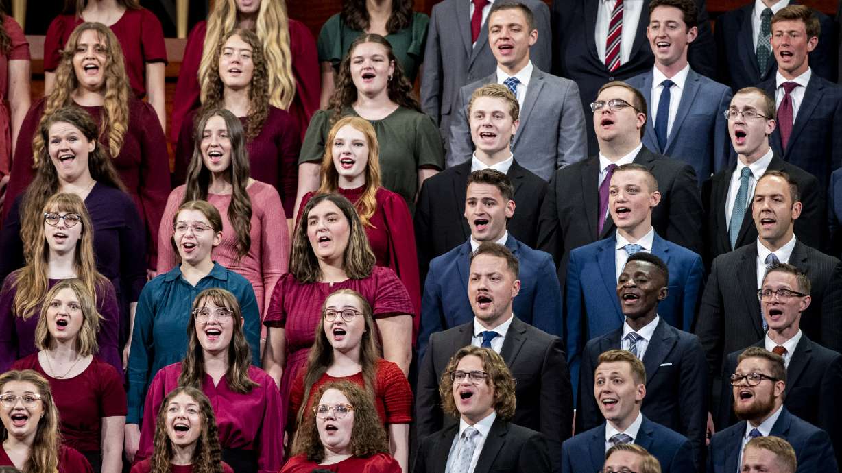 A combined institute choir from Ogden and South Jordan sings during the afternoon session of the 195th Semiannual General Conference of The Church of Jesus Christ of Latter-day Saints at the Conference Center in Salt Lake City on Saturday.