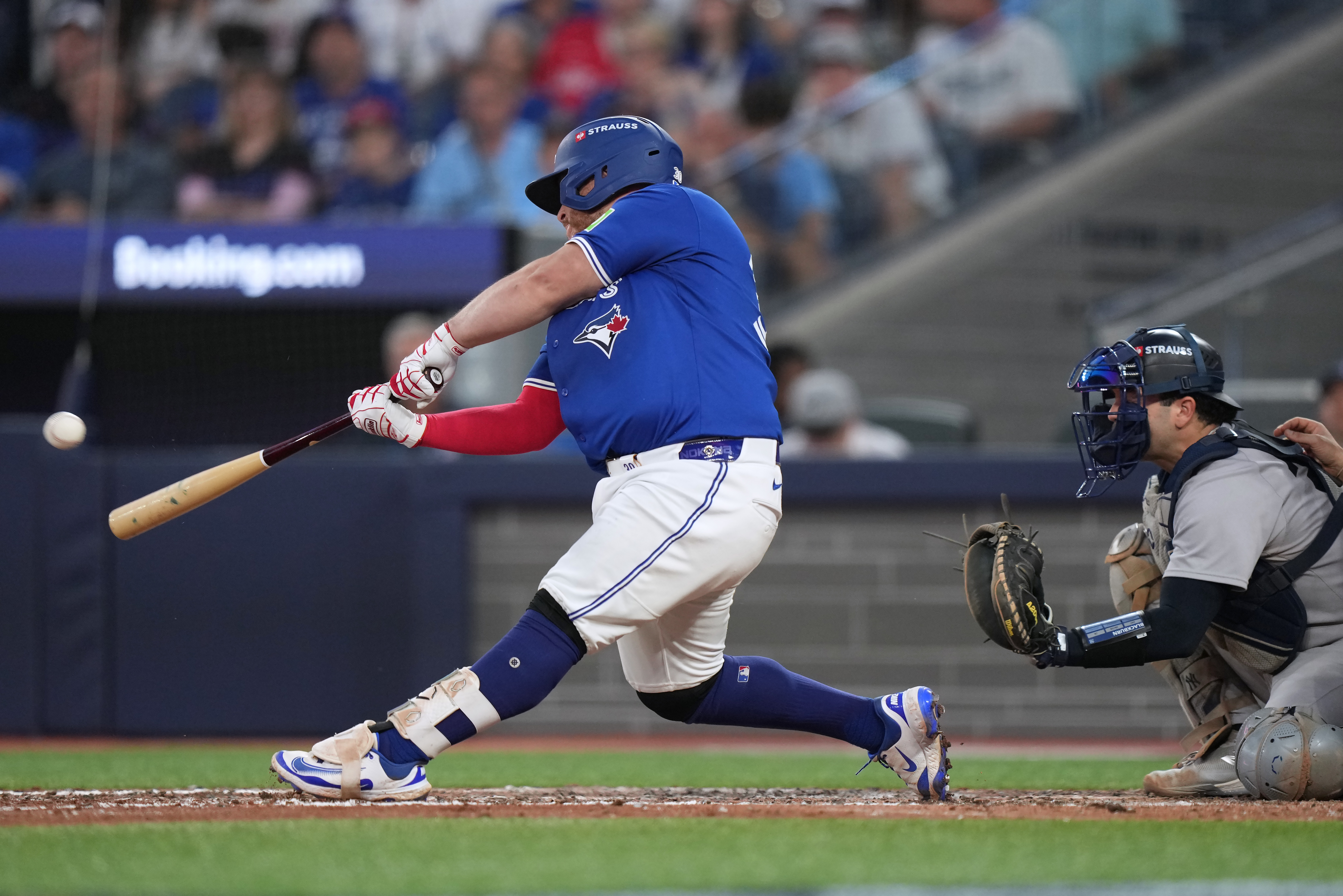 Toronto Blue Jays' Alejandro Kirk (30) hits a home run during the eighth inning against the New York Yankee in Game 1 of baseball's American League Division Series, Saturday, Oct. 4, 2025, in Toronto.