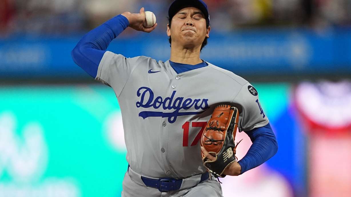 Los Angeles Dodgers' Shohei Ohtani pitches during the first inning in Game 1 of baseball's National League Division Series, Saturday, Oct. 4, 2025, in Philadelphia.