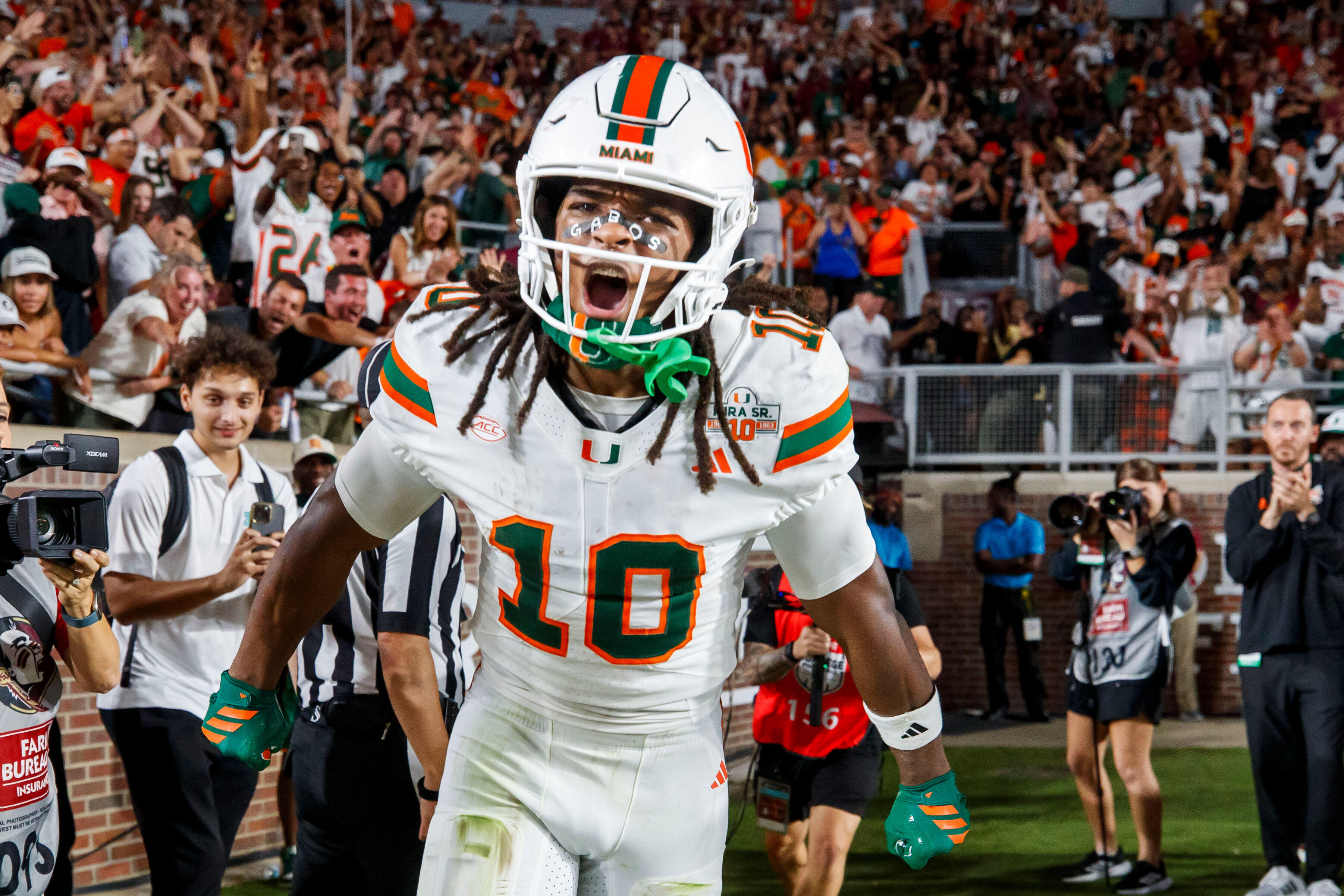 Miami wide receiver Malachi Toney (10) celebrates scoring a touchdown during the first half of an NCAA college football game, Saturday, Oct. 4, 2025, in Tallahassee, Fla.