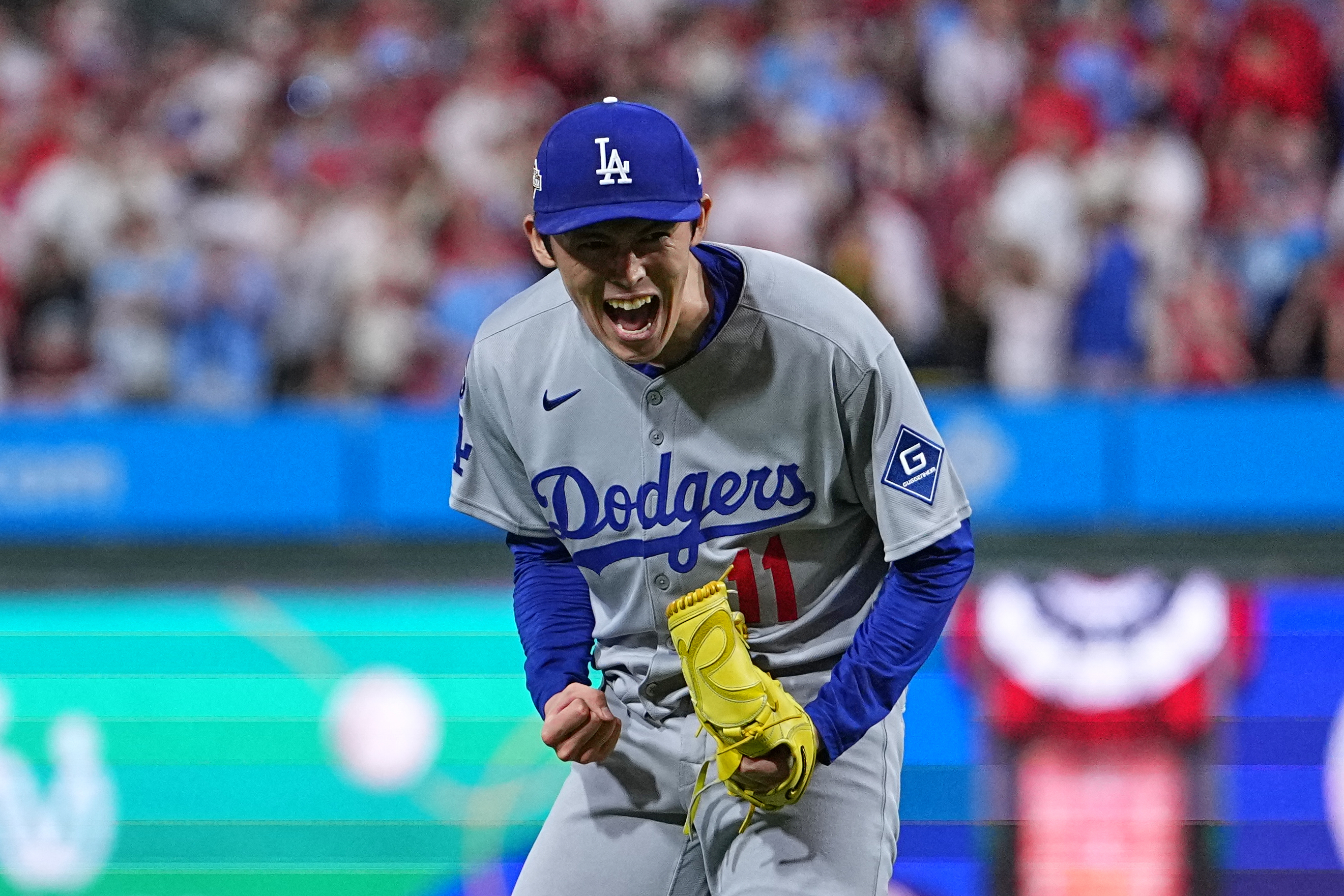 Los Angeles Dodgers pitcher Roki Sasaki reacts after the Dodgers defeated the Philadelphia Phillies in Game 1 of baseball's National League Division Series, Saturday, Oct. 4, 2025, in Philadelphia. 