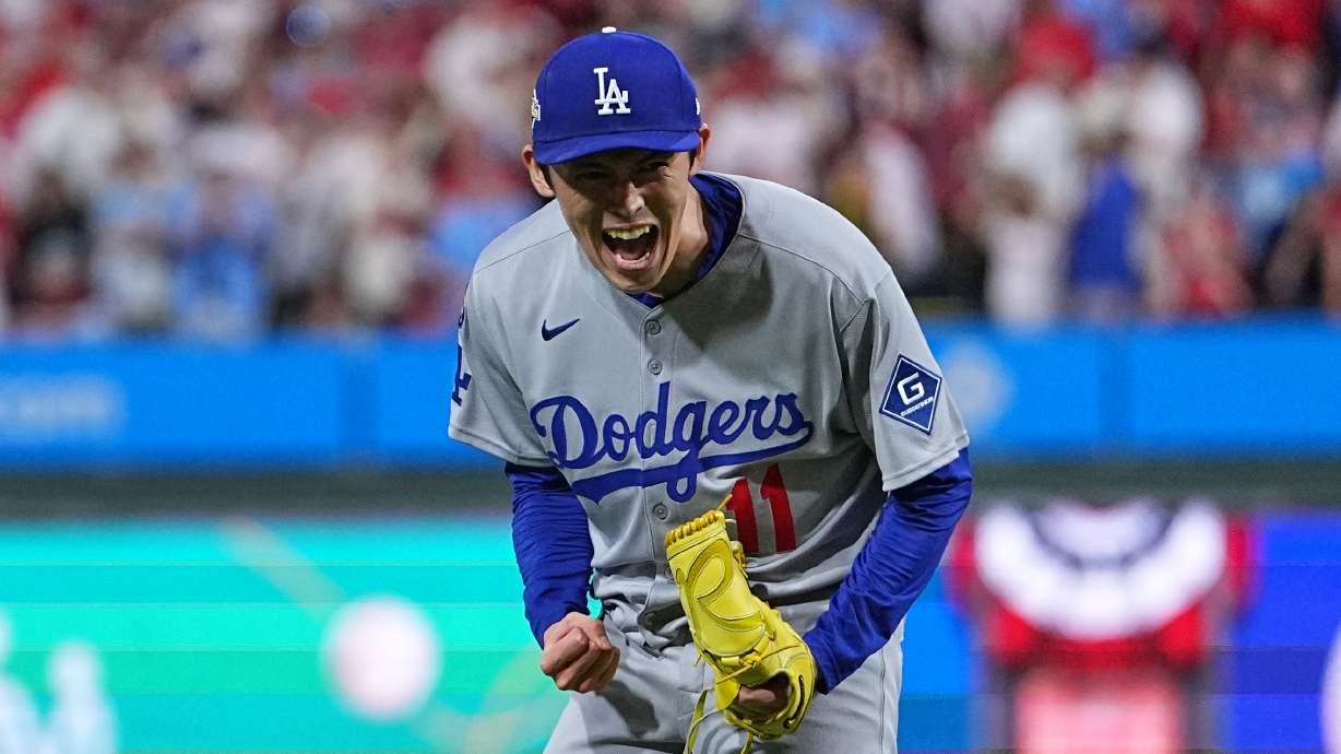 Los Angeles Dodgers pitcher Roki Sasaki reacts after the Dodgers defeated the Philadelphia Phillies in Game 1 of baseball's National League Division Series, Saturday, Oct. 4, 2025, in Philadelphia.