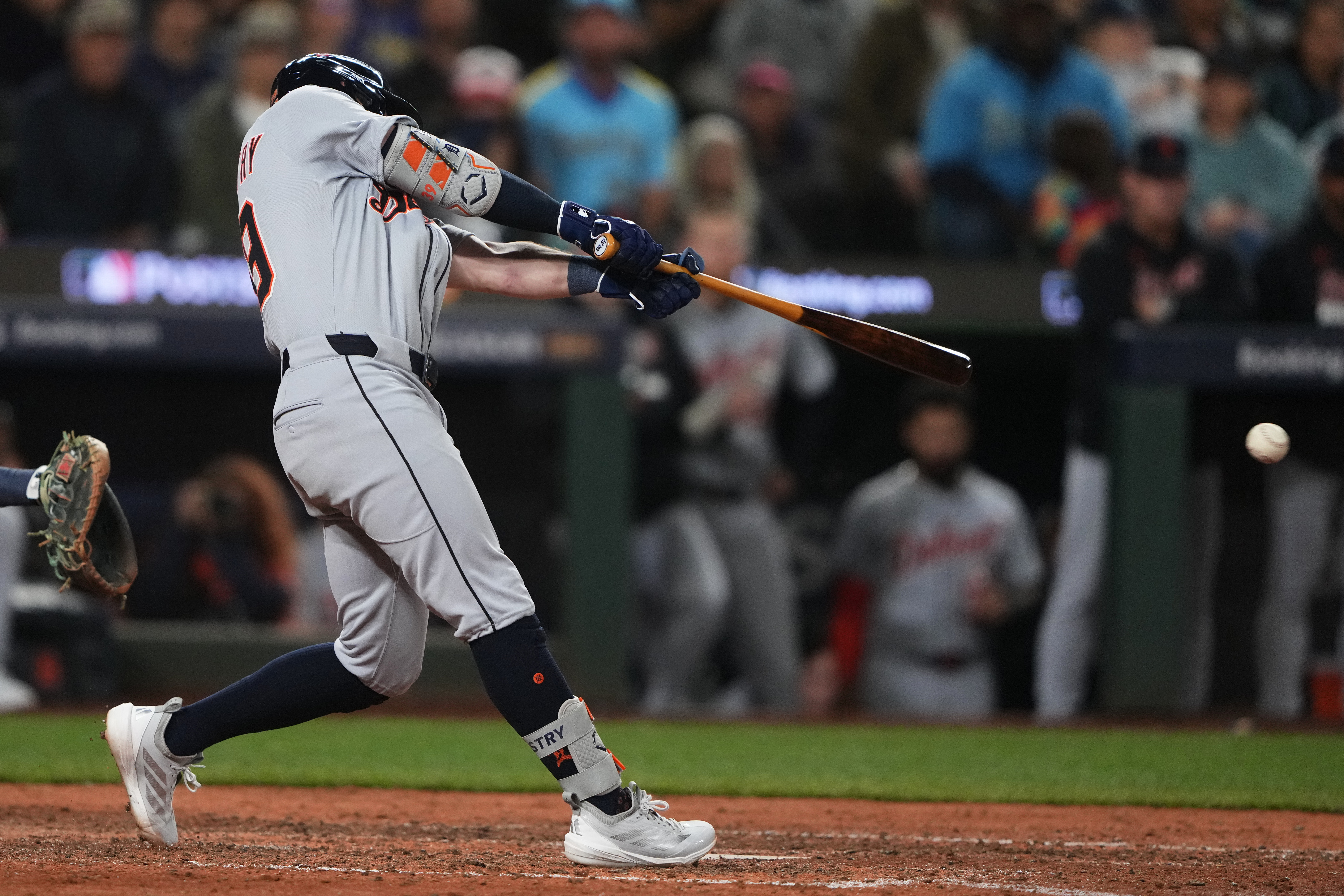 Detroit Tigers' Zach McKinstry hits a single to score Spencer Torkelson for the go-ahead run during the 11th inning in Game 1 of baseball's American League Division Series against the Seattle Mariners, Saturday, Oct. 4, 2025, in Seattle.