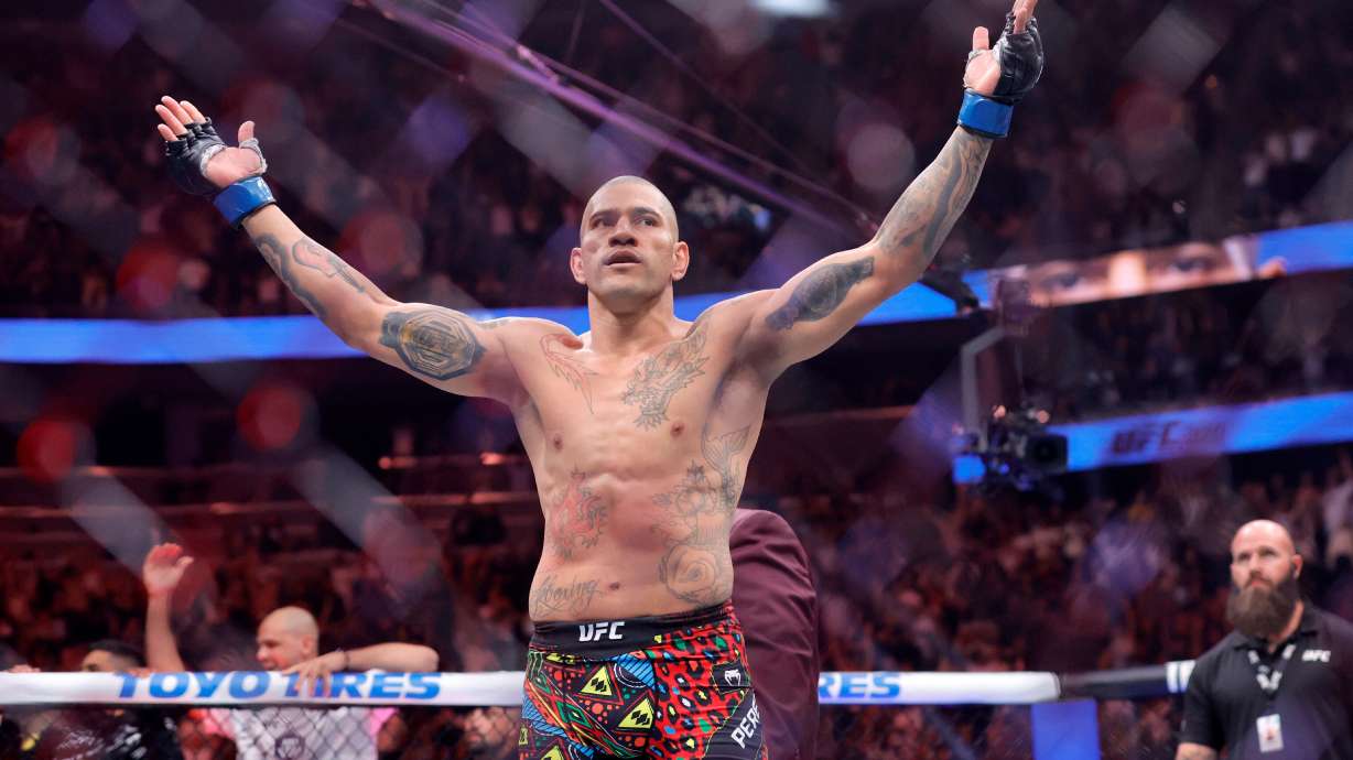 Alex Pereira, of Brazil, celebrates after defeating UFC light heavyweight champion Magomed Ankalaev, of Russia during the UFC 320 mixed martial arts bout Saturday, Oct. 4, 2025, in Las Vegas.