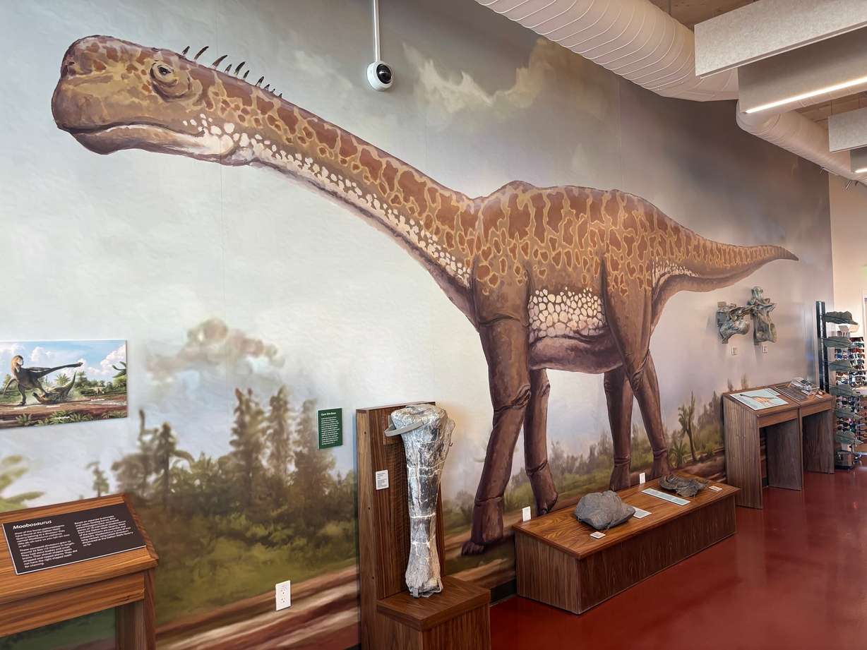 A mural at Utahraptor State Park depicting a Moabosaurus. The dinosaur, only recently discovered by paleontologists, was previously unknown.
