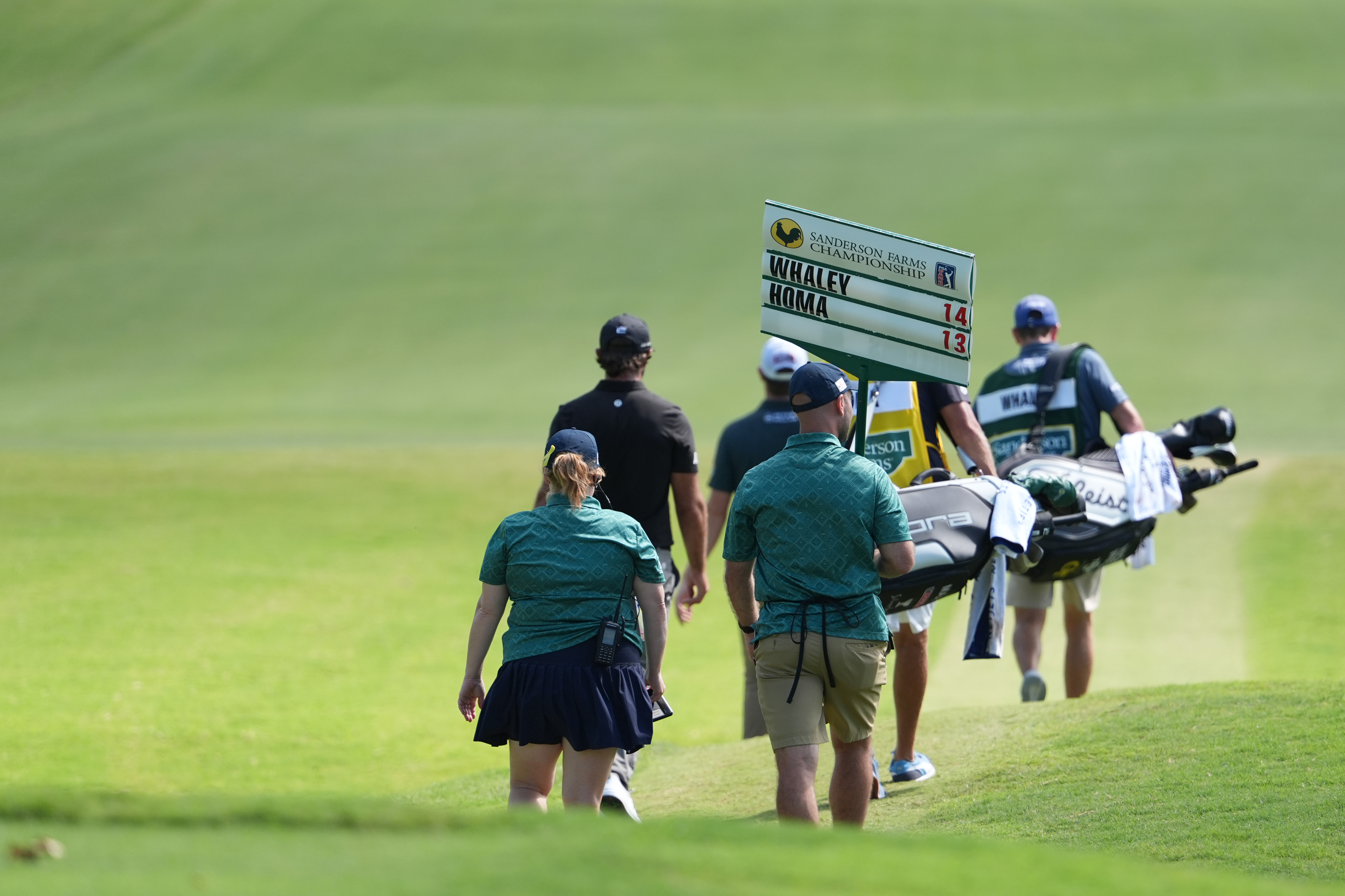 The group of Vince Whaley and Max Homa walks down the No. 1 fairway during the fourth round of the Sanderson Farms Championship golf tournament, Sunday, Oct. 5, 2025, in Jackson, Miss. 