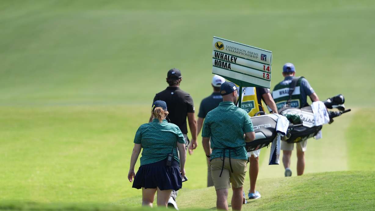 The group of Vince Whaley and Max Homa walks down the No. 1 fairway during the fourth round of the Sanderson Farms Championship golf tournament, Sunday, Oct. 5, 2025, in Jackson, Miss.