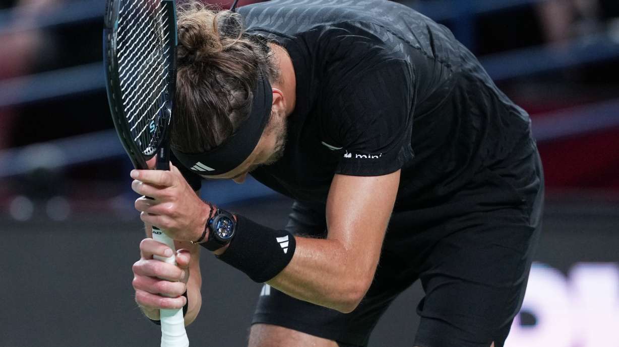 Alexander Zverev of Germany reacts after losing a point to Arthur Rinderknech of France during the men's singles match of the Shanghai Masters tennis tournament at Qizhong Forest Sports City Tennis Center, in Shanghai, China, Monday, October. 6, 2025.