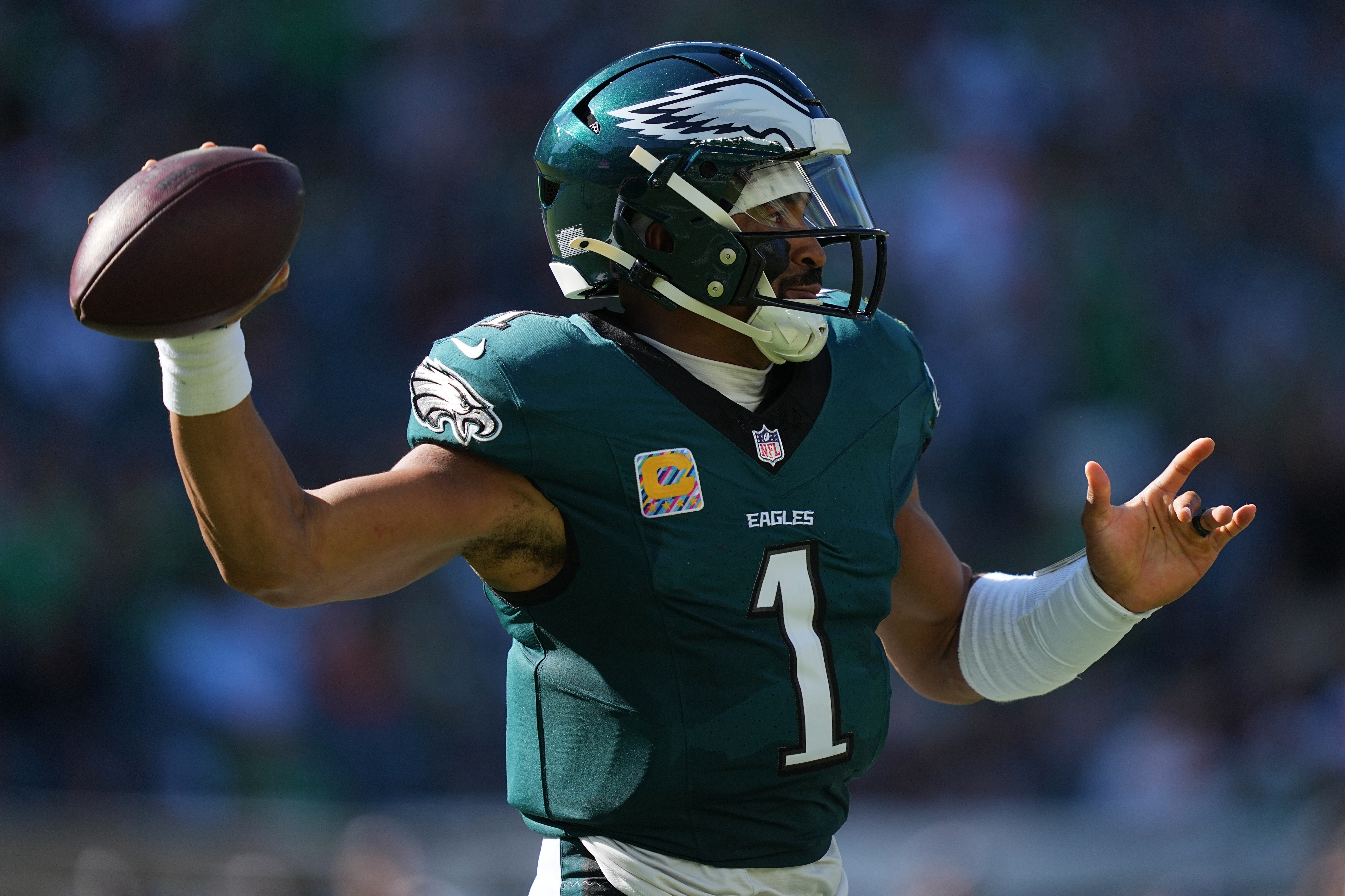 Philadelphia Eagles quarterback Jalen Hurts looks to pass during the second half of an NFL football game against the Denver Broncos on Sunday, Oct. 5, 2025, in Philadelphia. 
