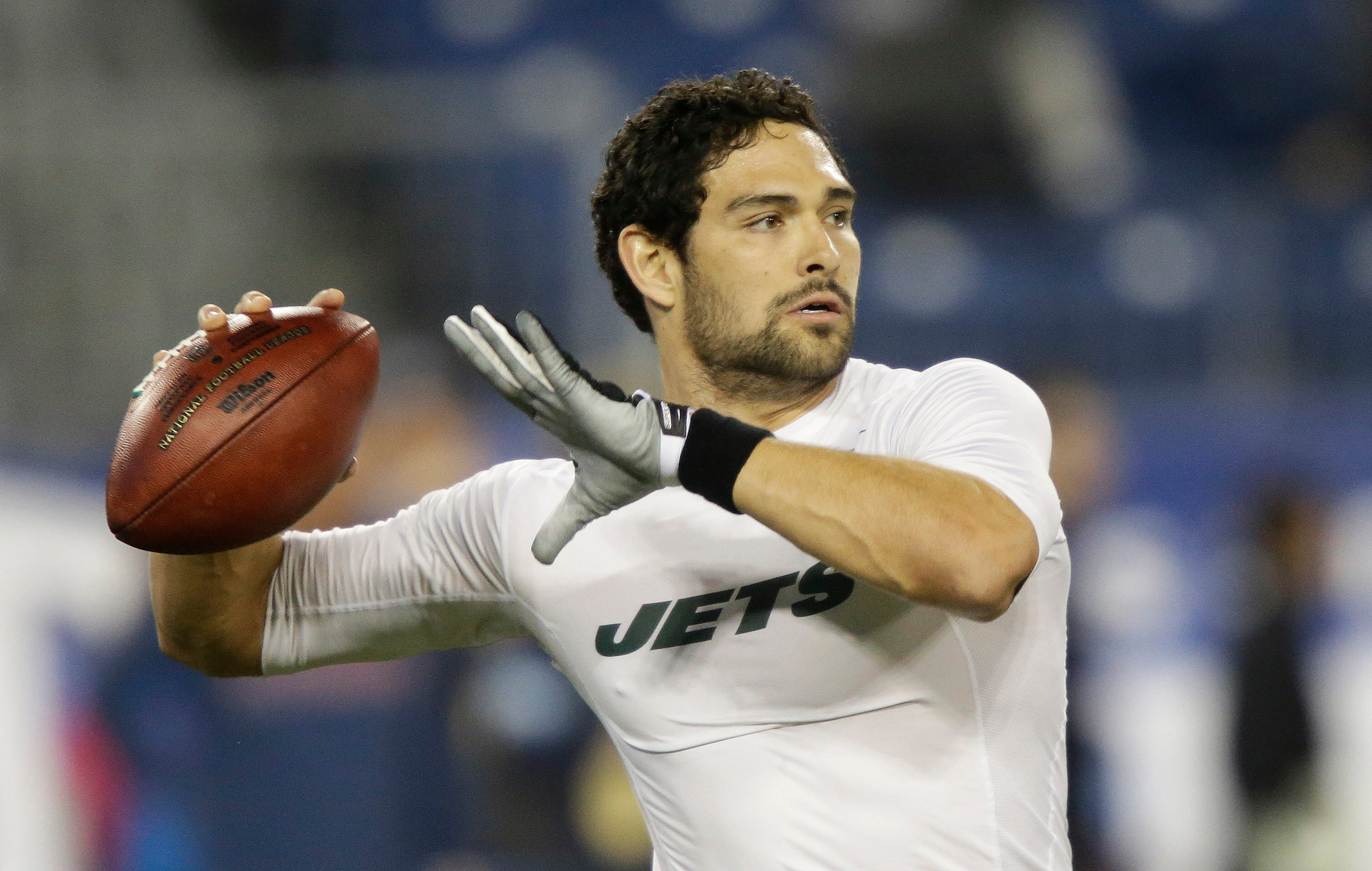 FILE - New York Jets quarterback Mark Sanchez warms up before an NFL football game between the Jets and the Tennessee Titans on Monday, Dec. 17, 2012, in Nashville, Tenn.