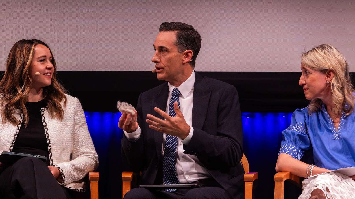 Kaylee Merrill, a seminary principal, left, and Jenet Erickson, a BYU associate professor of church history and doctrine, right, listen to comments by John Hilton III, a BYU professor of ancient scripture, during a forum for seminary and institute leaders and teachers during the Religious Communicators Conference at Brigham Young University in Provo, June 13.