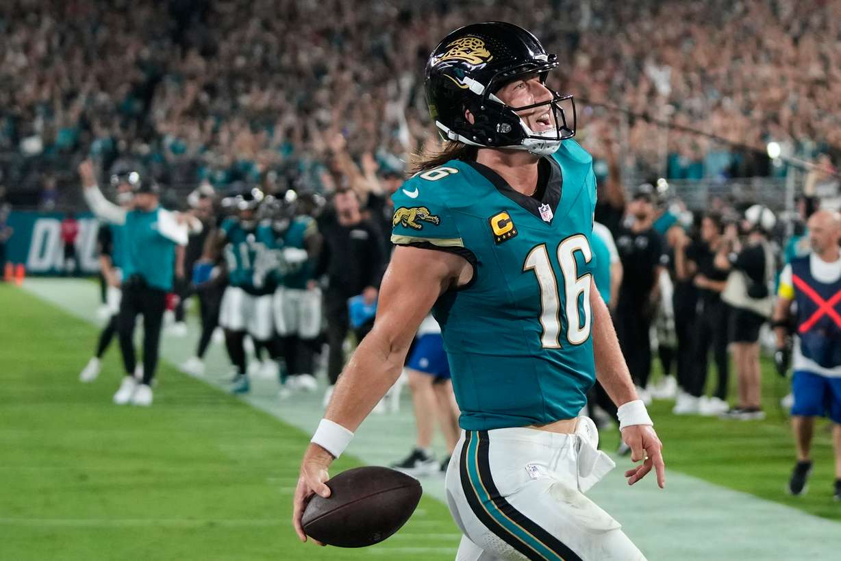 Jacksonville Jaguars quarterback Trevor Lawrence celebrates after scoring a touchdown during the second half of an NFL football game against the Kansas City Chiefs, Monday, Oct. 6, 2025, in Jacksonville, Fla.