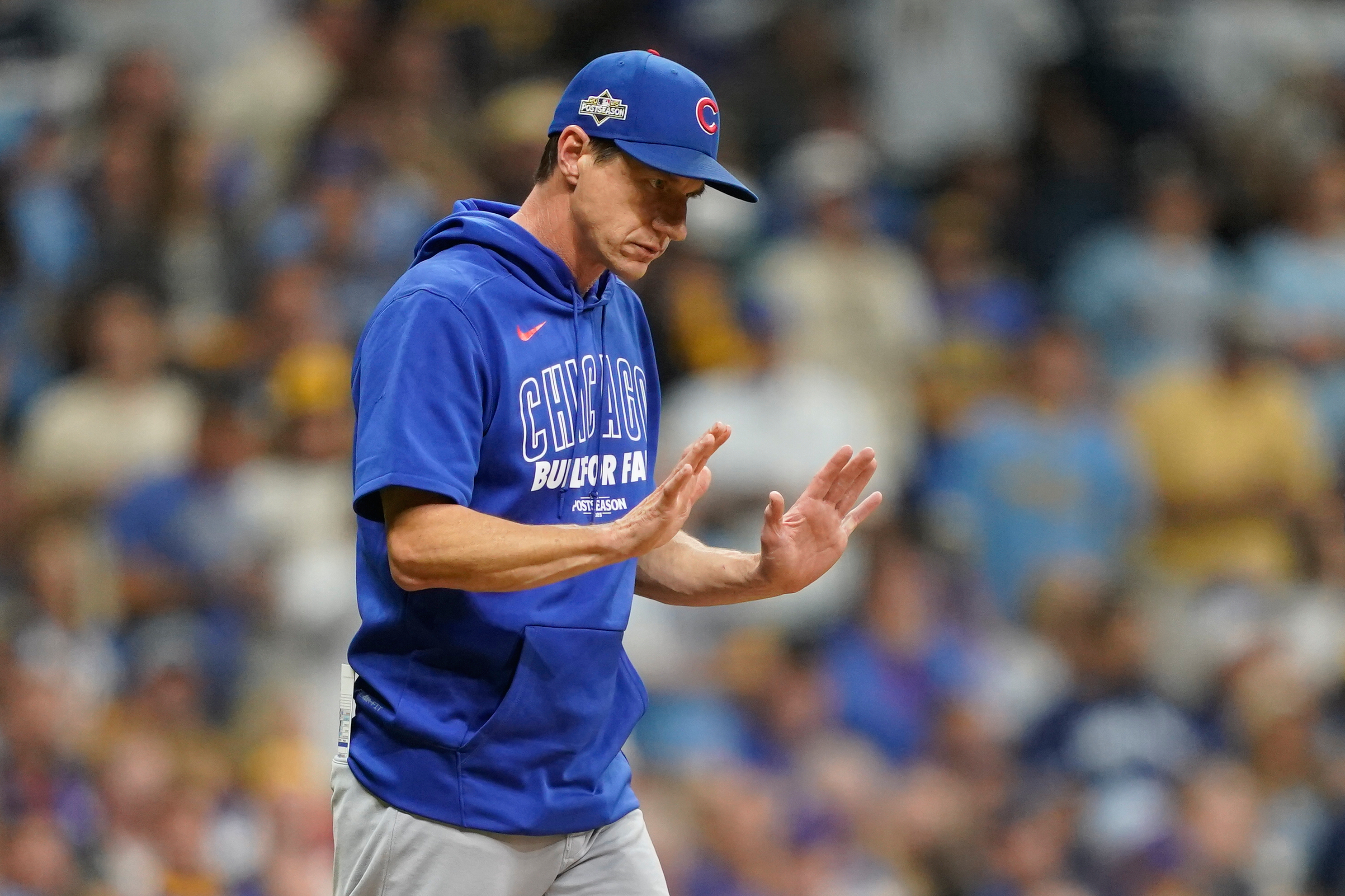 Chicago Cubs manager Craig Counsell comes to the mound to make a pitching change during the third inning of Game 2 of baseball's National League Division Series against the Milwaukee Brewers Monday, Oct. 6, 2025, in Milwaukee.
