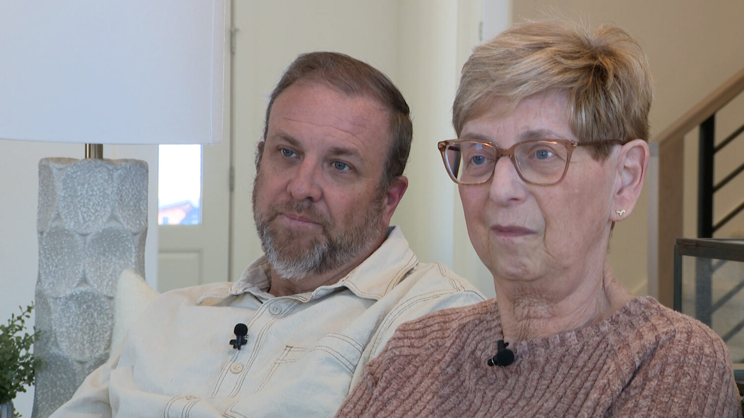 Scott Thomas, left, and his mother-in-law Linda Rasmussen, right, speak with KSL-TV Monday about their search for a home.