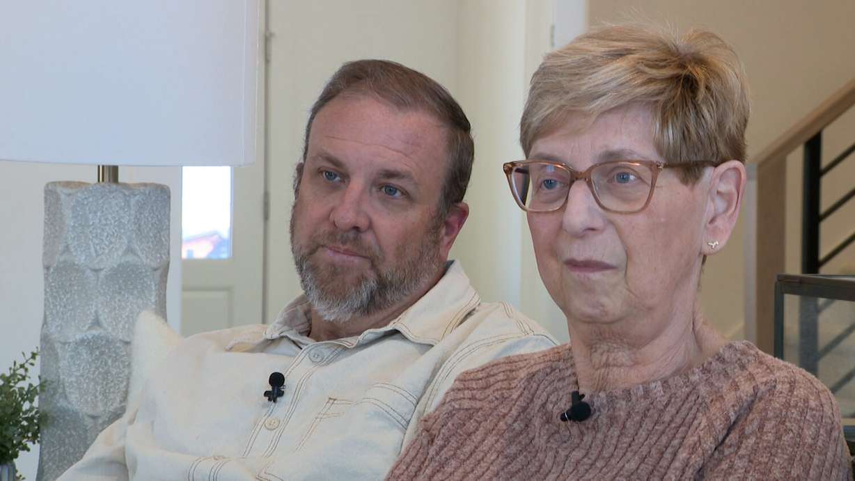 Scott Thomas, left, and his mother-in-law Linda Rasmussen, right, speak with KSL-TV Monday about their search for a home.