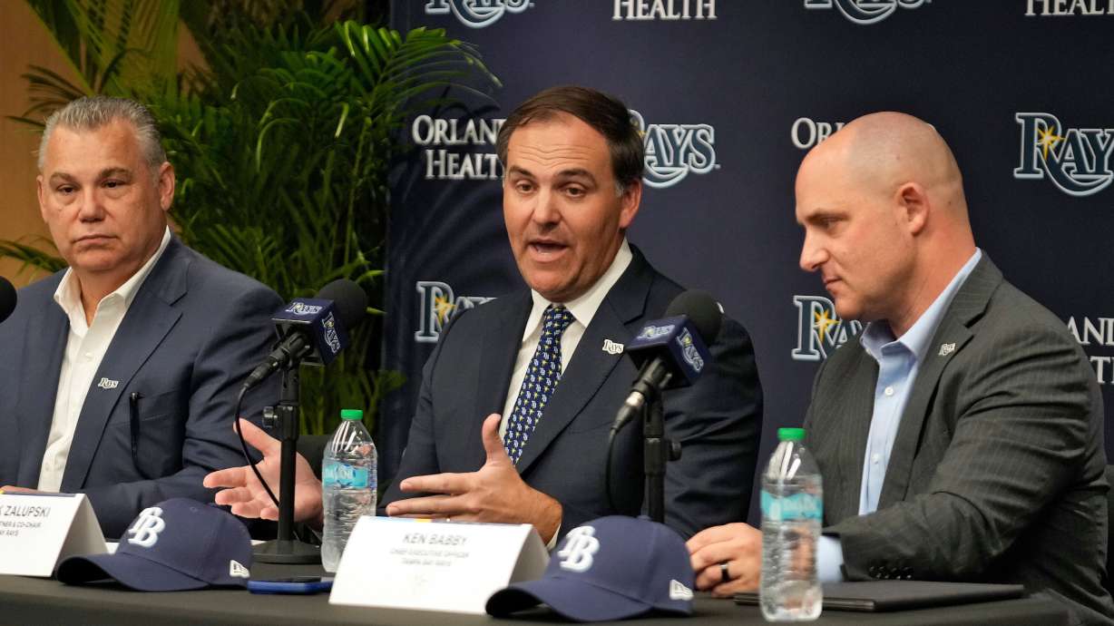 New Tampa Bay Rays ownership managing partner and co-chair Patrick Zalupski, center, answers a question, as co-chair Bill Cosgrove, left, and chief executive officer Ken Babby, right, look on during an introductory baseball news conference, Tuesday, Oct. 7, 2025, in Tampa, Fla.