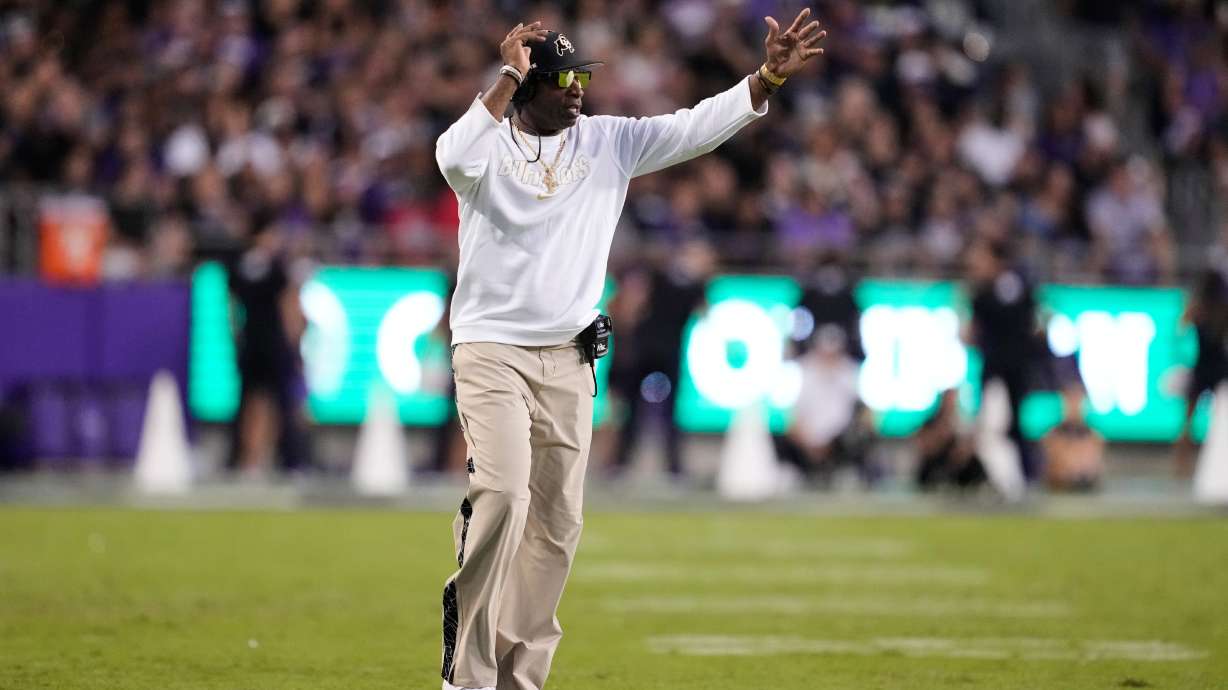 Colorado head coach Deion Sanders calls for a time out in the first half of an NCAA college football game against TCU Saturday, Oct. 4, 2025, in Fort Worth, Texas.