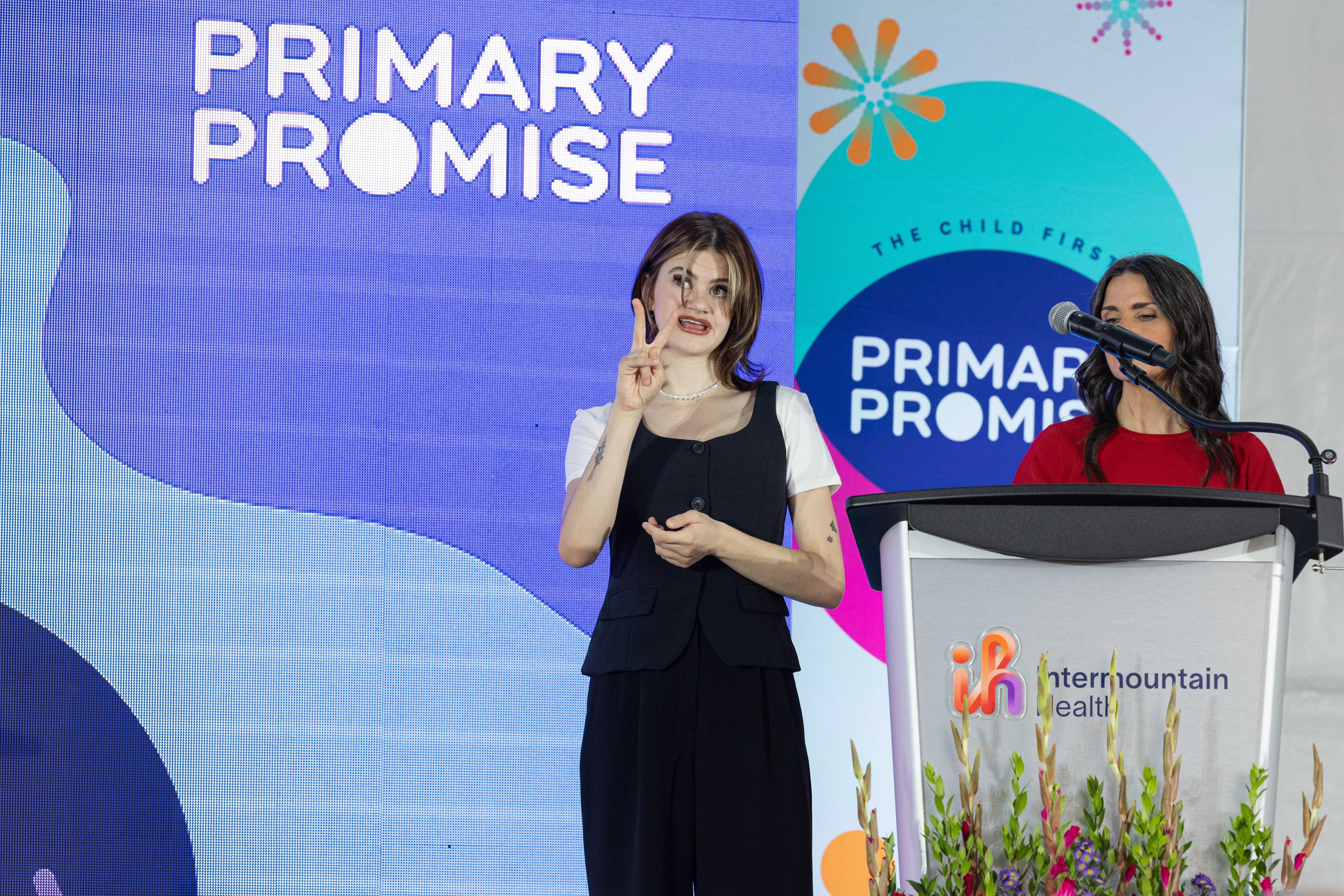Rachel Glade, a patient treated at Primary Children's Hospital, speaks at the ribbon-cutting ceremony for Primary Children's Hospital Behavioral Health Center in Taylorsville on Aug. 22.