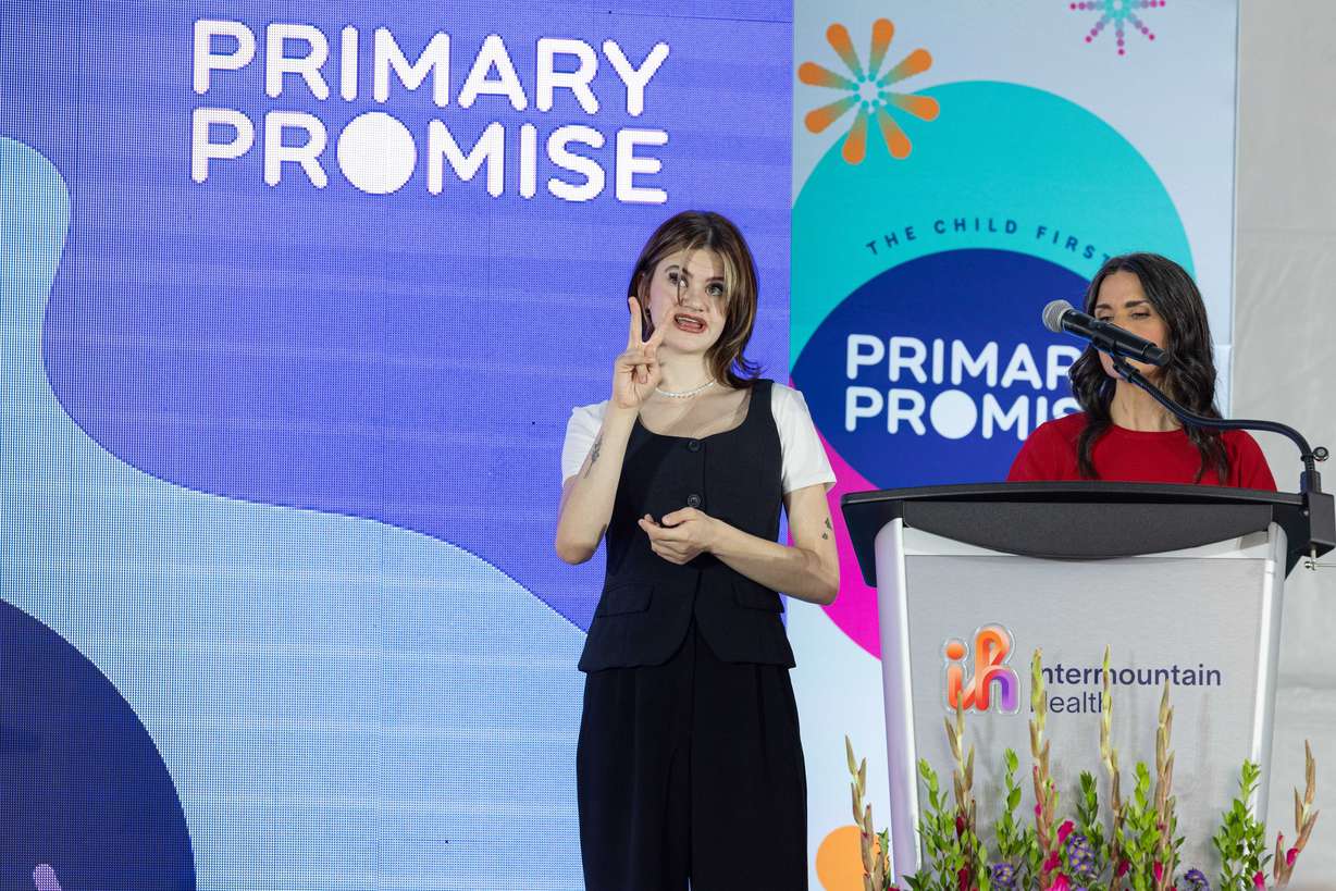 Rachel Glade, a patient treated at Primary Children's Hospital, speaks at the ribbon-cutting ceremony for Primary Children's Hospital Behavioral Health Center in Taylorsville on Aug. 22.