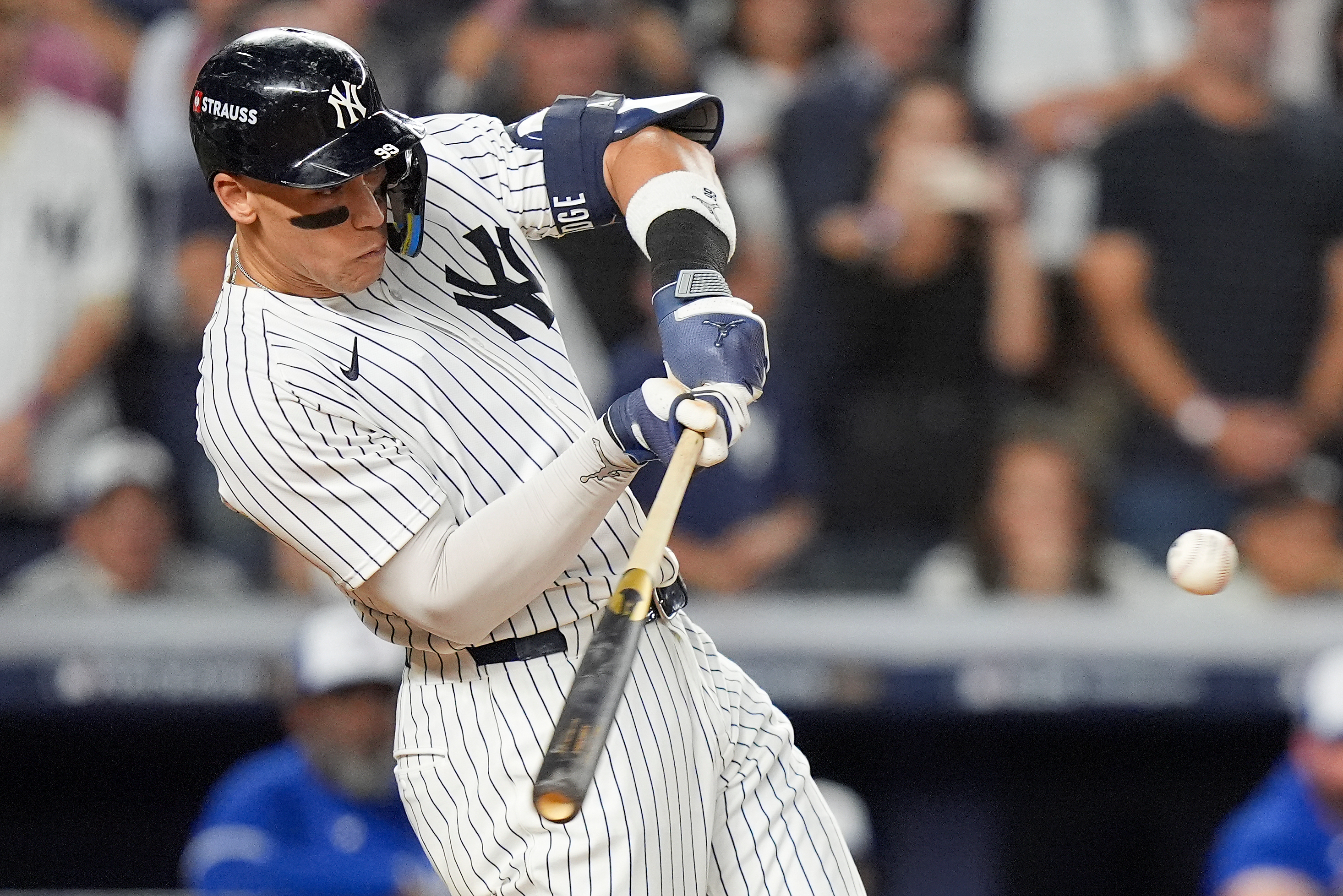 New York Yankees' Aaron Judge connects for a three-run home run against the Toronto Blue Jays during the fourth inning of Game 3 of baseball's American League Division Series, Tuesday, Oct. 7, 2025, in New York.