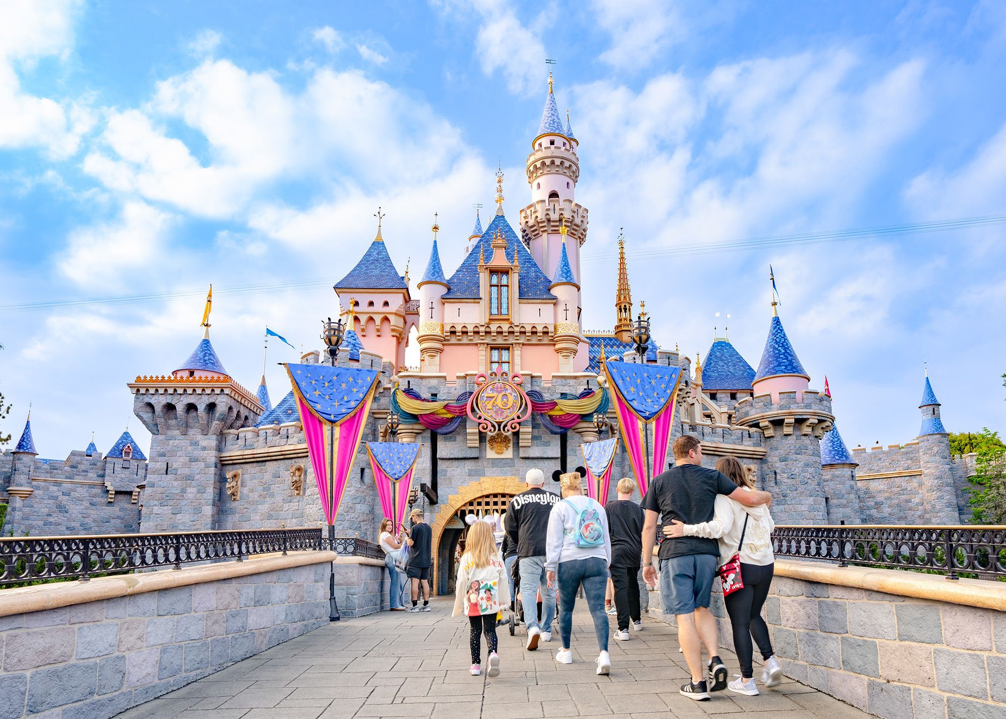 Disneyland during its 70th anniversary celebration on May 17 in Anaheim, California. U.S. Disney parks are rolling out steep discounts and modest price increases.