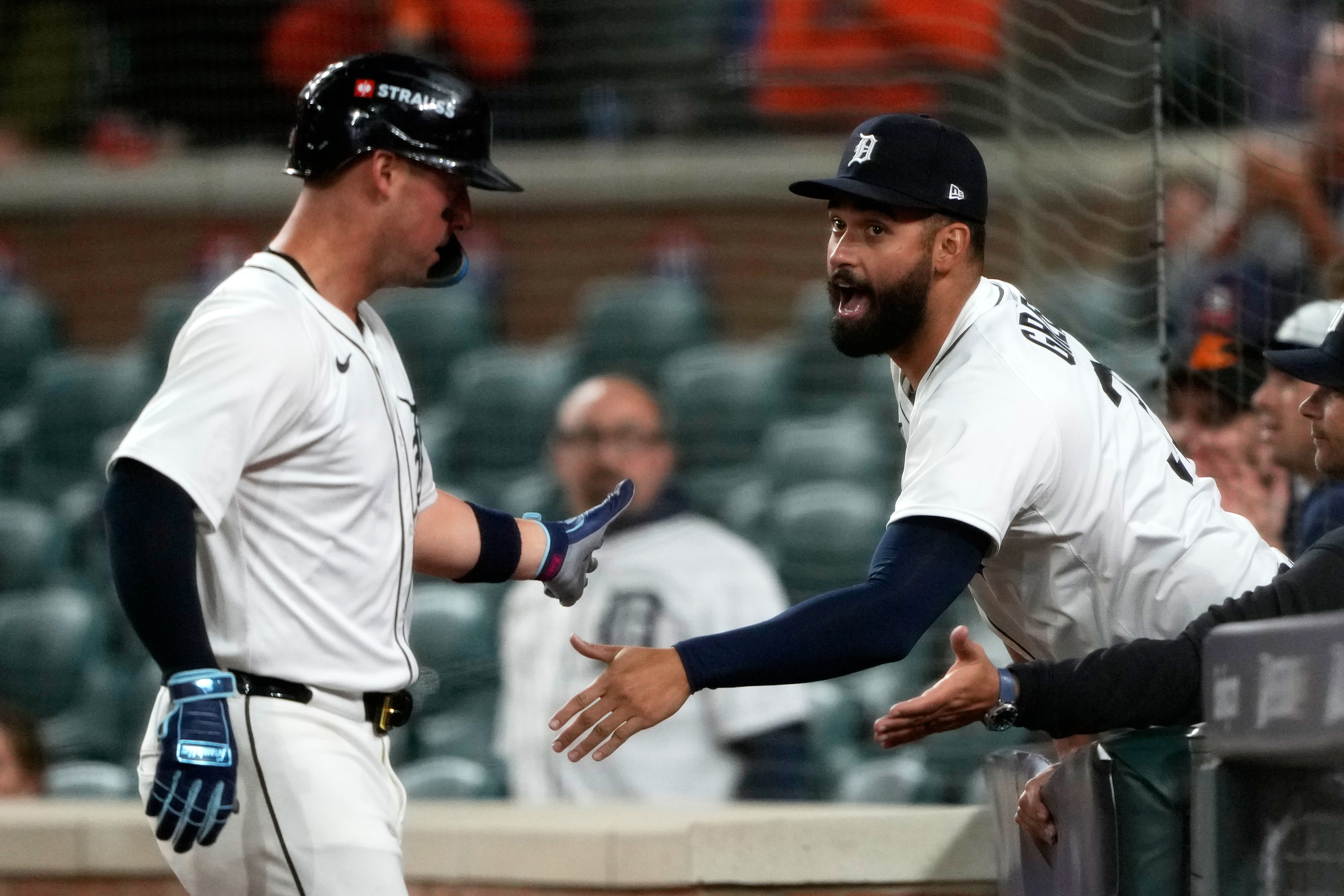 Detroit Tigers' Spencer Torkelson, left, is congratulated by teammate Riley Greene after scoring during the ninth inning in Game 3 of baseball's American League Division Series against the Seattle Mariners Tuesday, Oct. 7, 2025, in Detroit. 