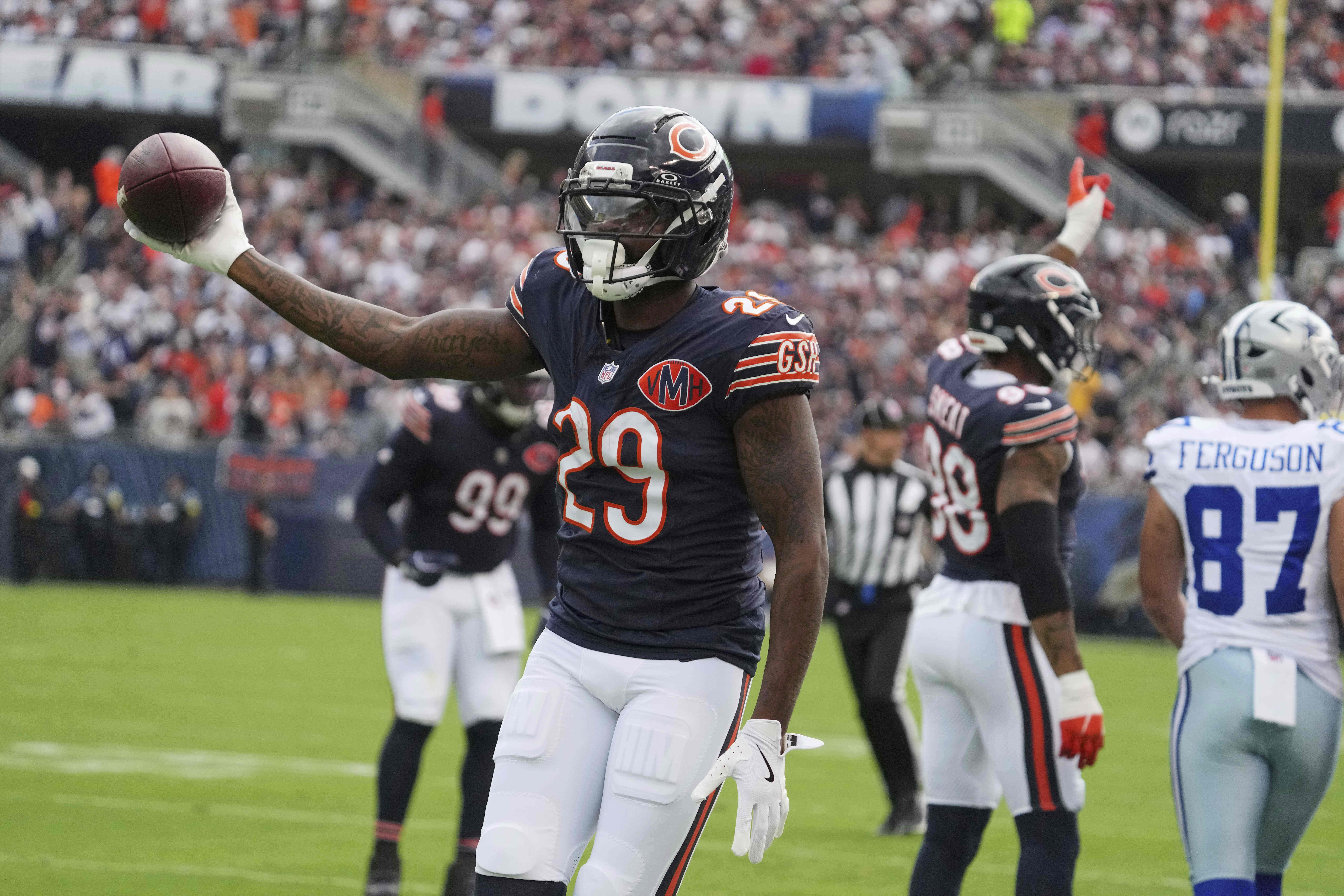 Chicago Bears cornerback Tyrique Stevenson (29) celebrates after stripping the ball away from Dallas Cowboys running back Javonte Williams in the first half of an NFL football game Sunday, Sept. 21, 2025, in Chicago.