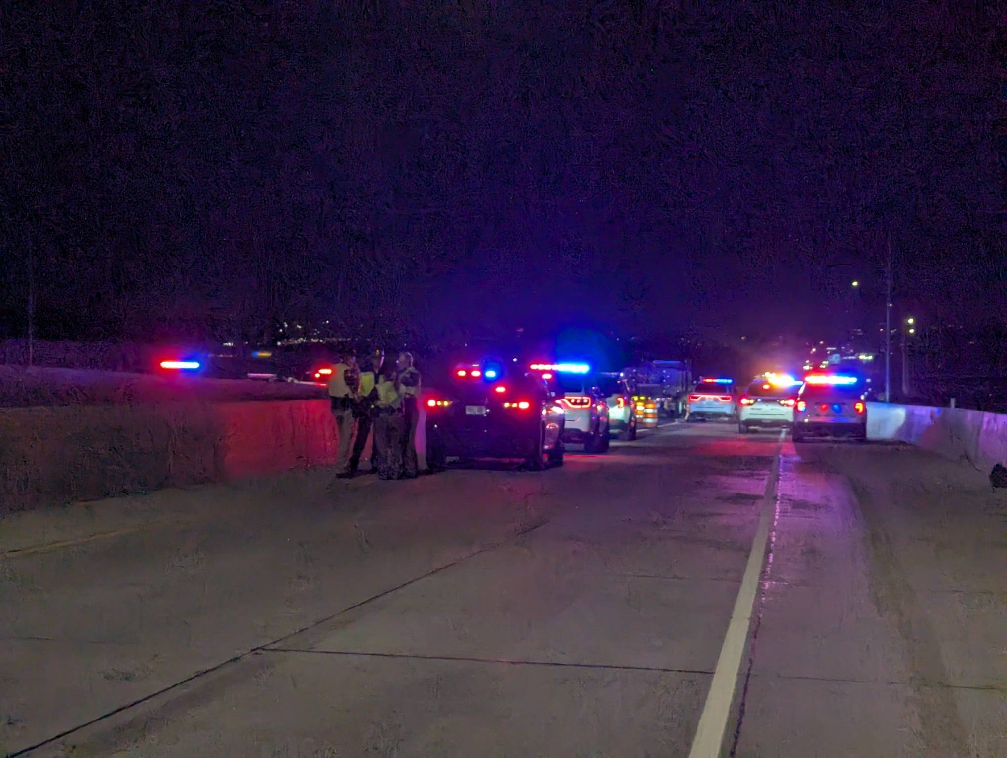 State troopers respond to a fatal motorcycle crash in the eastbound lanes of Bangerter Highway near 2700 West in Bluffdale on Wednesday.