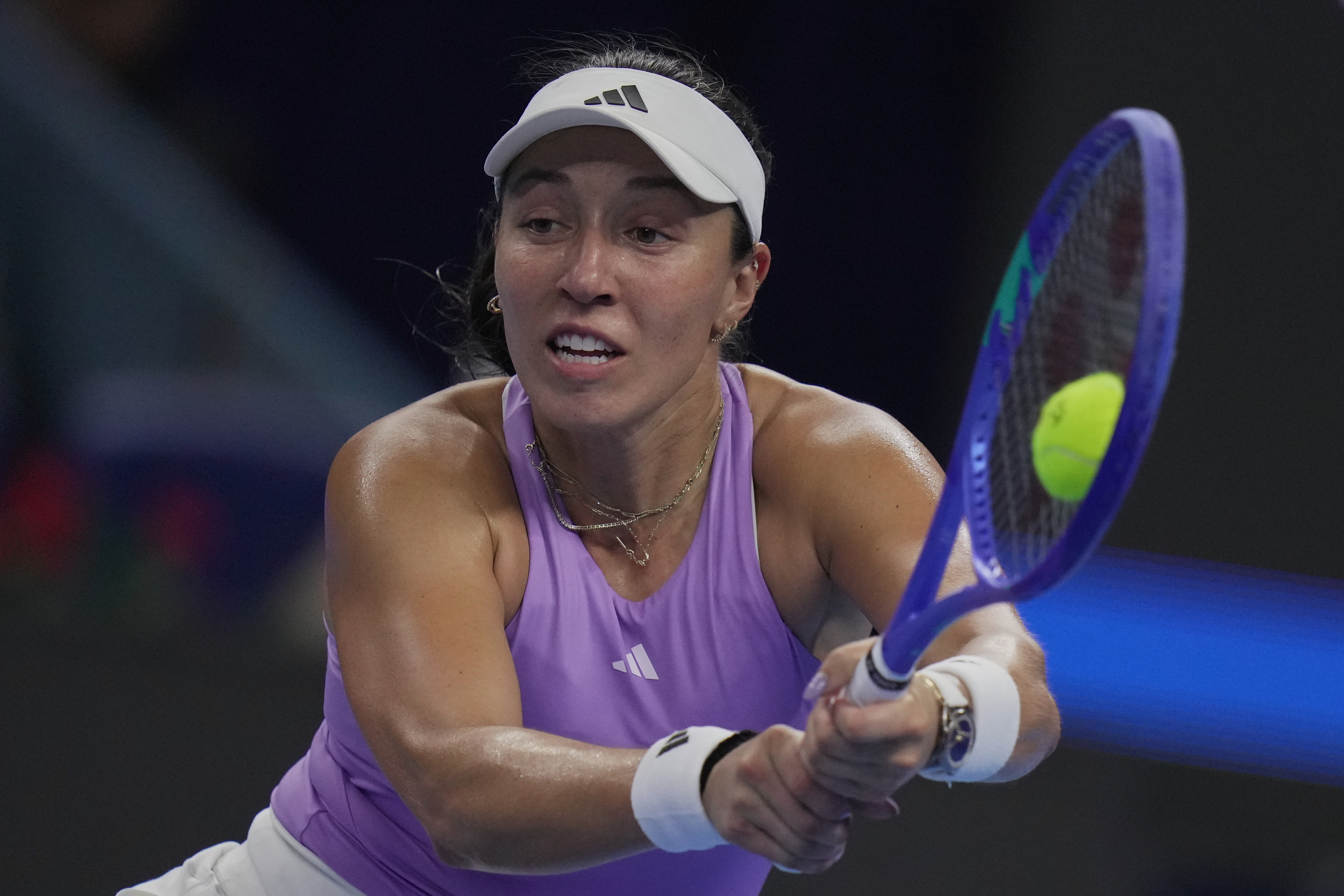 Jessica Pegula, of the United States returns a backhand shot from Linda Noskova, of the Czech Republic during the women's singles semifinals match of the China Open tennis tournament, at the National Tennis Center, in Beijing, Saturday, Oct. 4, 2025.