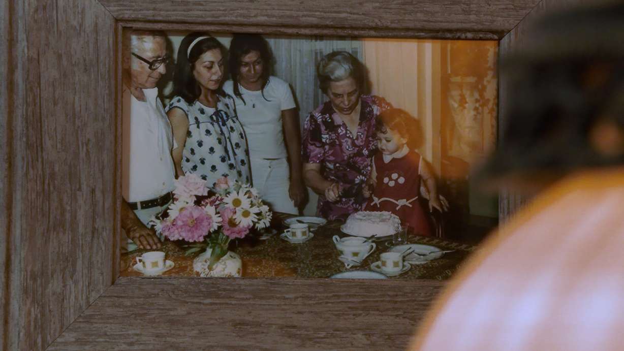 A photo of Elif Ekin as a youngster displayed at her cafe in Salt Lake City.