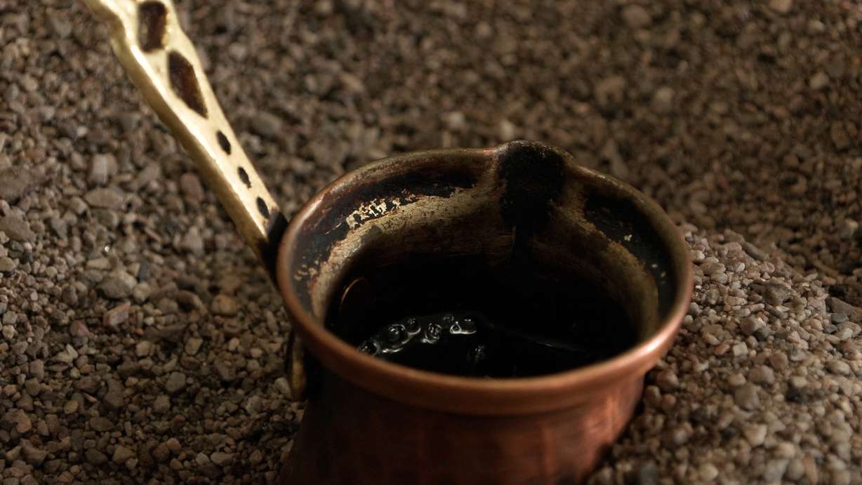 Brewing Turkish coffee in hot sand in Salt Lake City.
