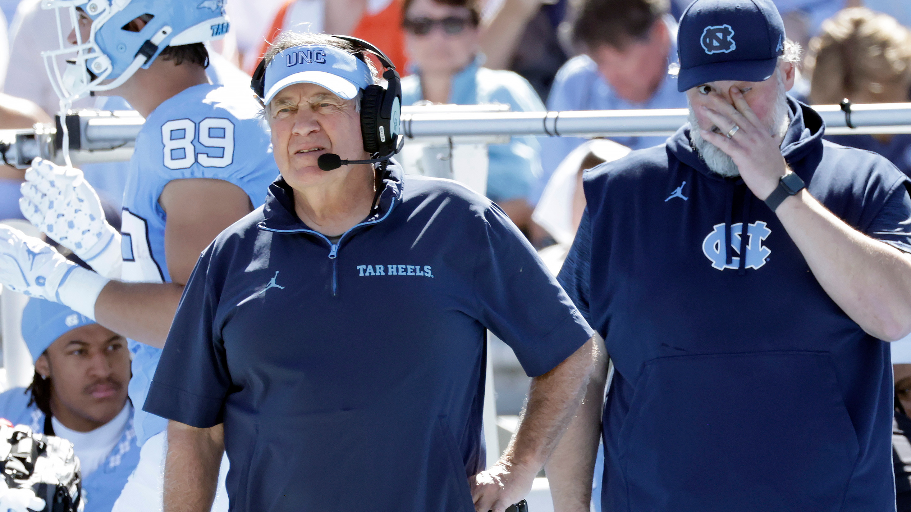 North Carolina head coach Bill Belichick, left, watches during the first half of an NCAA college football game against Clemson, Saturday, Oct. 4, 2025, in Chapel Hill, N.C.