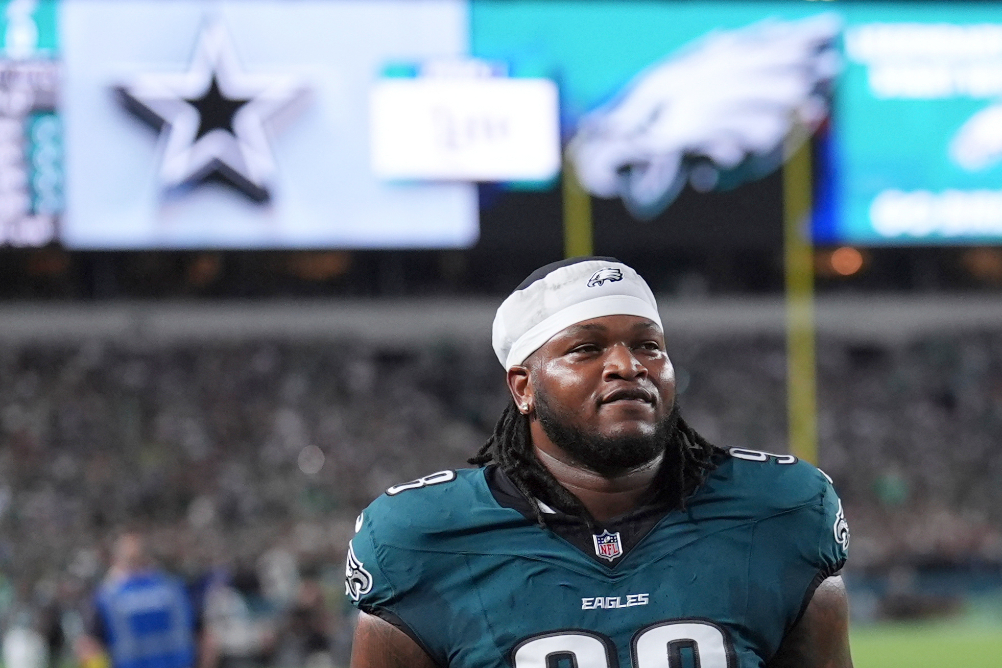 FILE - Philadelphia Eagles' Jalen Carter walks off the field after being ejected from an NFL football game against the Dallas Cowboys, Thursday, Sept. 4, 2025, in Philadelphia. 