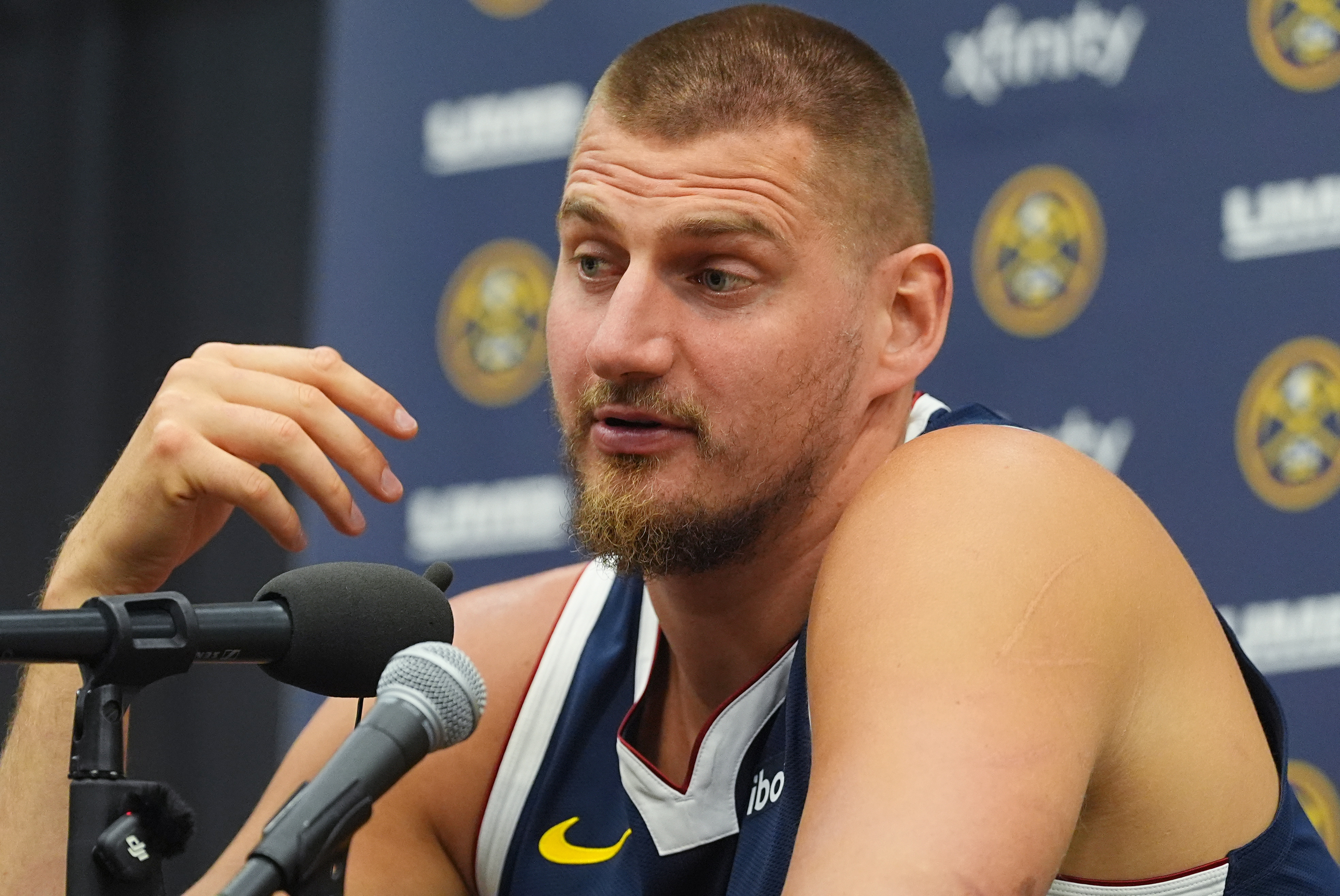 Denver Nuggets center Nikola Jokic responds to questions during an NBA basketball media day news conference Monday, Sept. 29, 2025, in Denver.