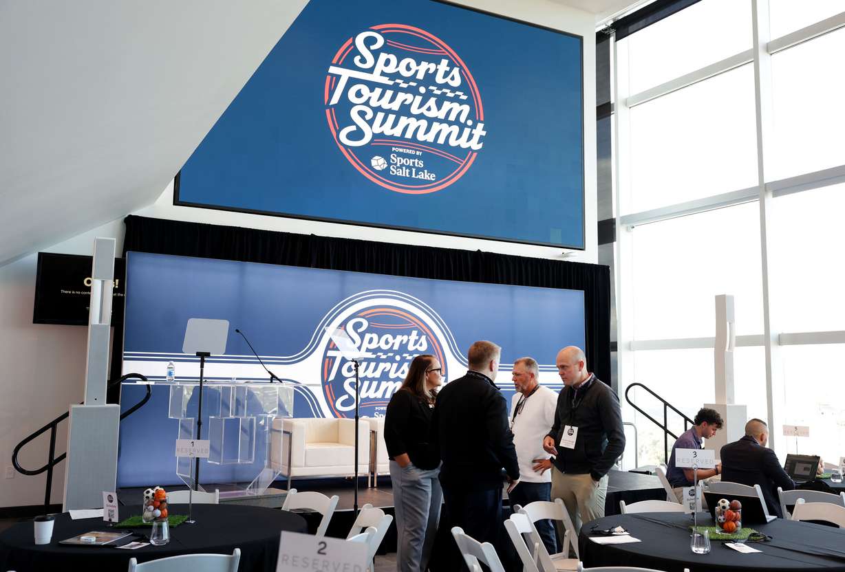 People attend the fourth annual Sports Tourism Summit at Rice-Eccles Stadium in Salt Lake City on Thursday.
