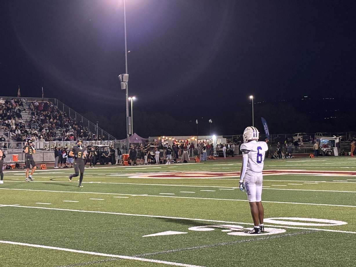#6 Legend Glasker waits for the offense's play call during a game against Lone Peak.
