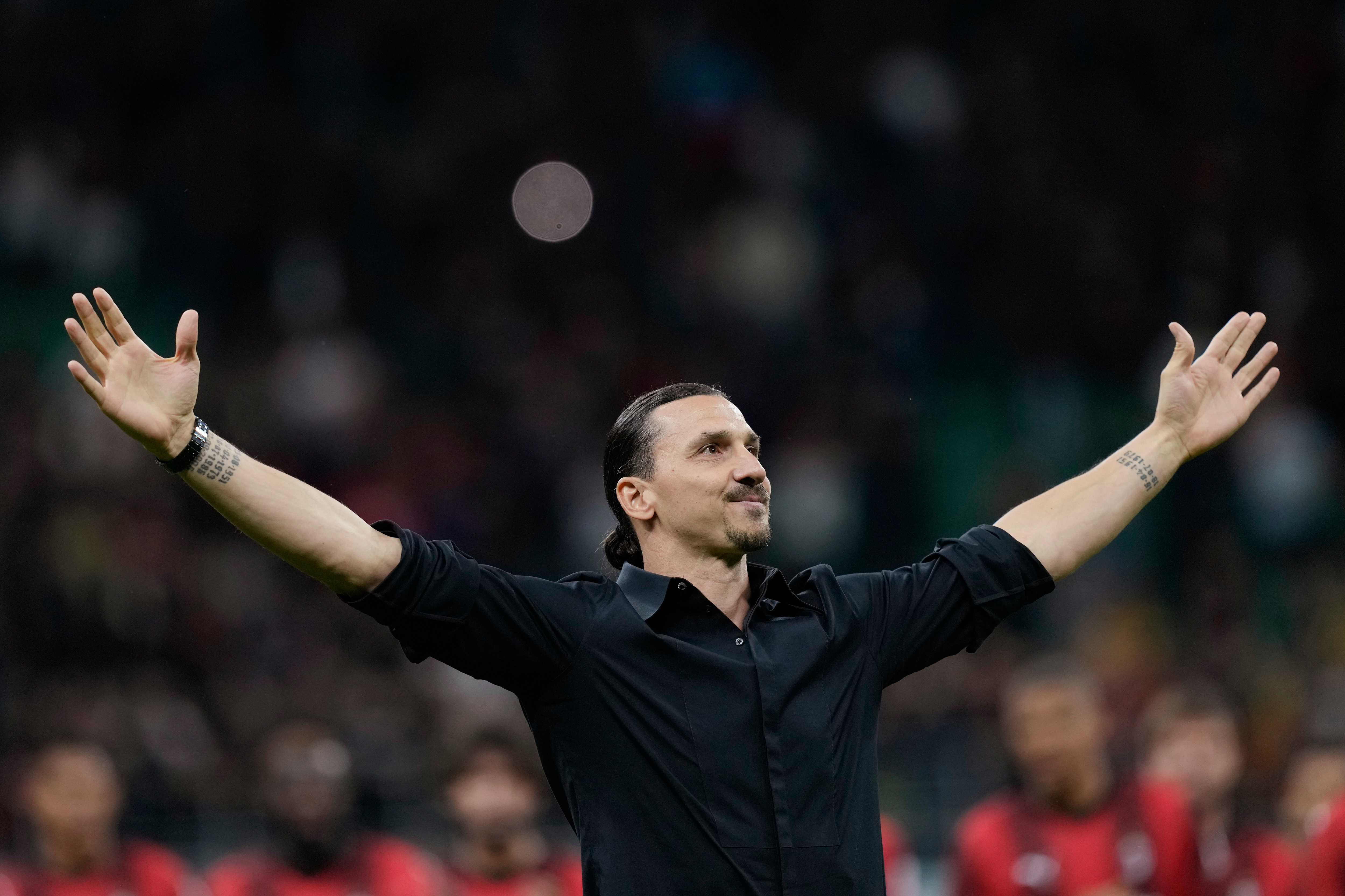 FILE = AC Milan's Zlatan Ibrahimovic reacts after his last game for the club at the end of a Serie A soccer match between AC Milan and Hellas Verona at the San Siro stadium in Milan, Italy, on June 4, 2023.