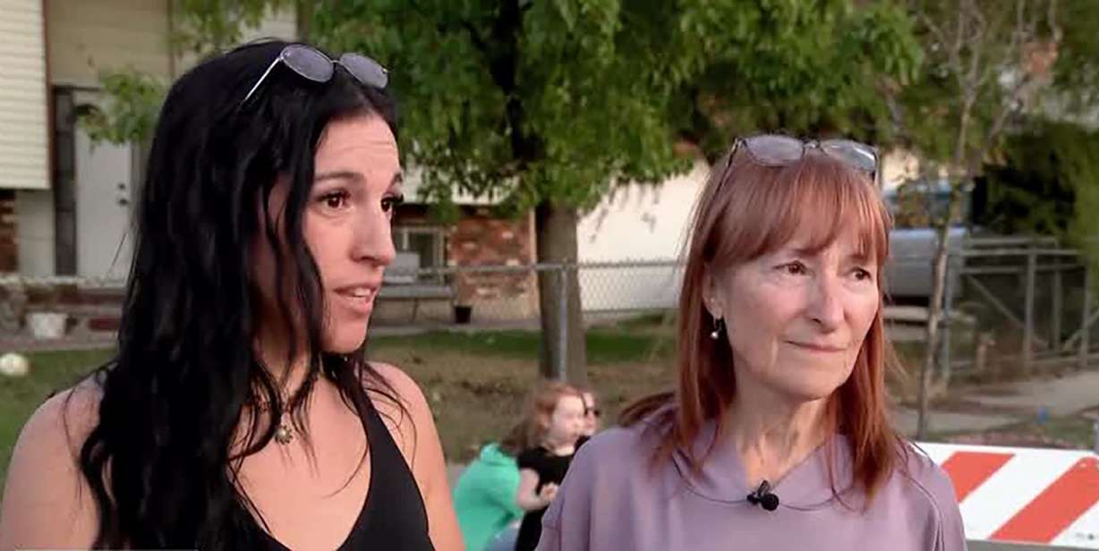 Isabel Vega, right, and her daughter, Ines Barrios, left, were among the families hardest hit by a weekend storm in Rose Park. They spoke to KSL at a block party on Thursday.