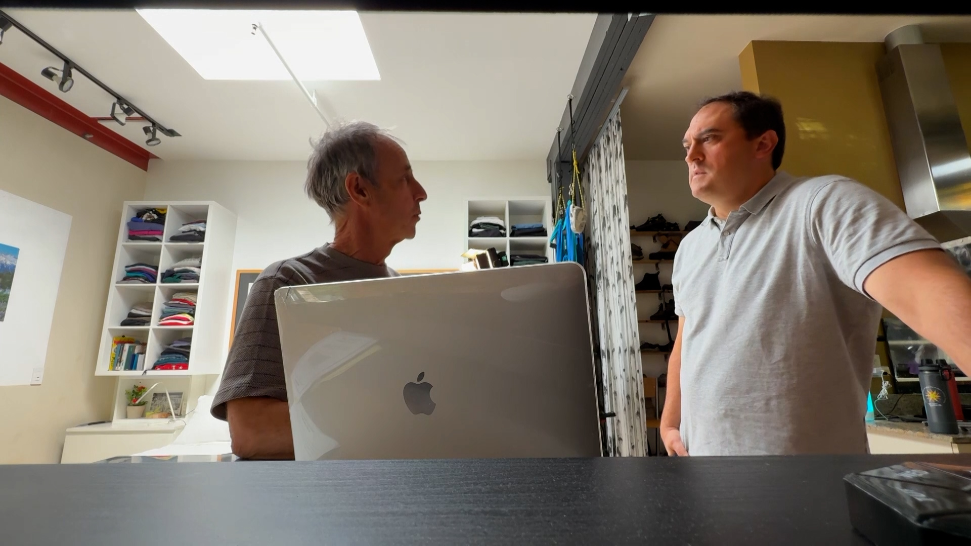 Gene Hanfling shows KSL’s Matt Gephardt photos of the damaged blinds and his lifetime warranty statement that he said shows the manufacturer should repair or replace the blinds.