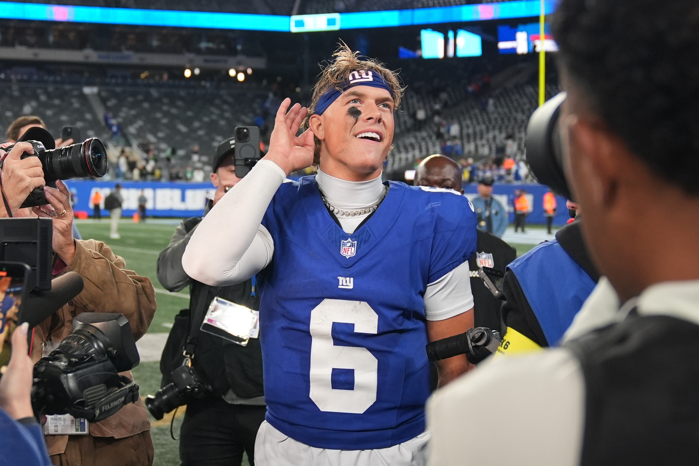 New York Giants' Jaxson Dart reacts after an NFL football game against the Philadelphia Eagles Thursday, Oct. 9, 2025, in East Rutherford, N.J. 