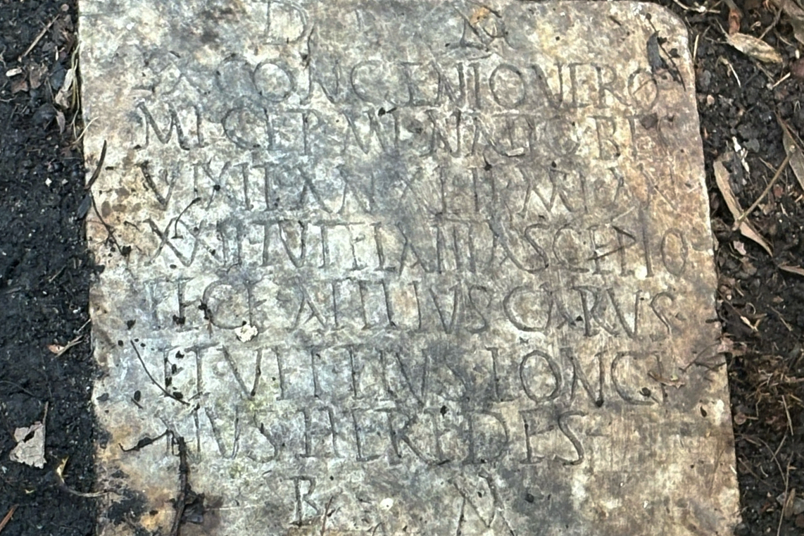 A Latin inscription on a 1,900-year-old grave marker of a Roman sailor named Sextus Congenius Verus, discovered in a New Orleans backyard. The FBI is talking to Italian officials to repatriate it.