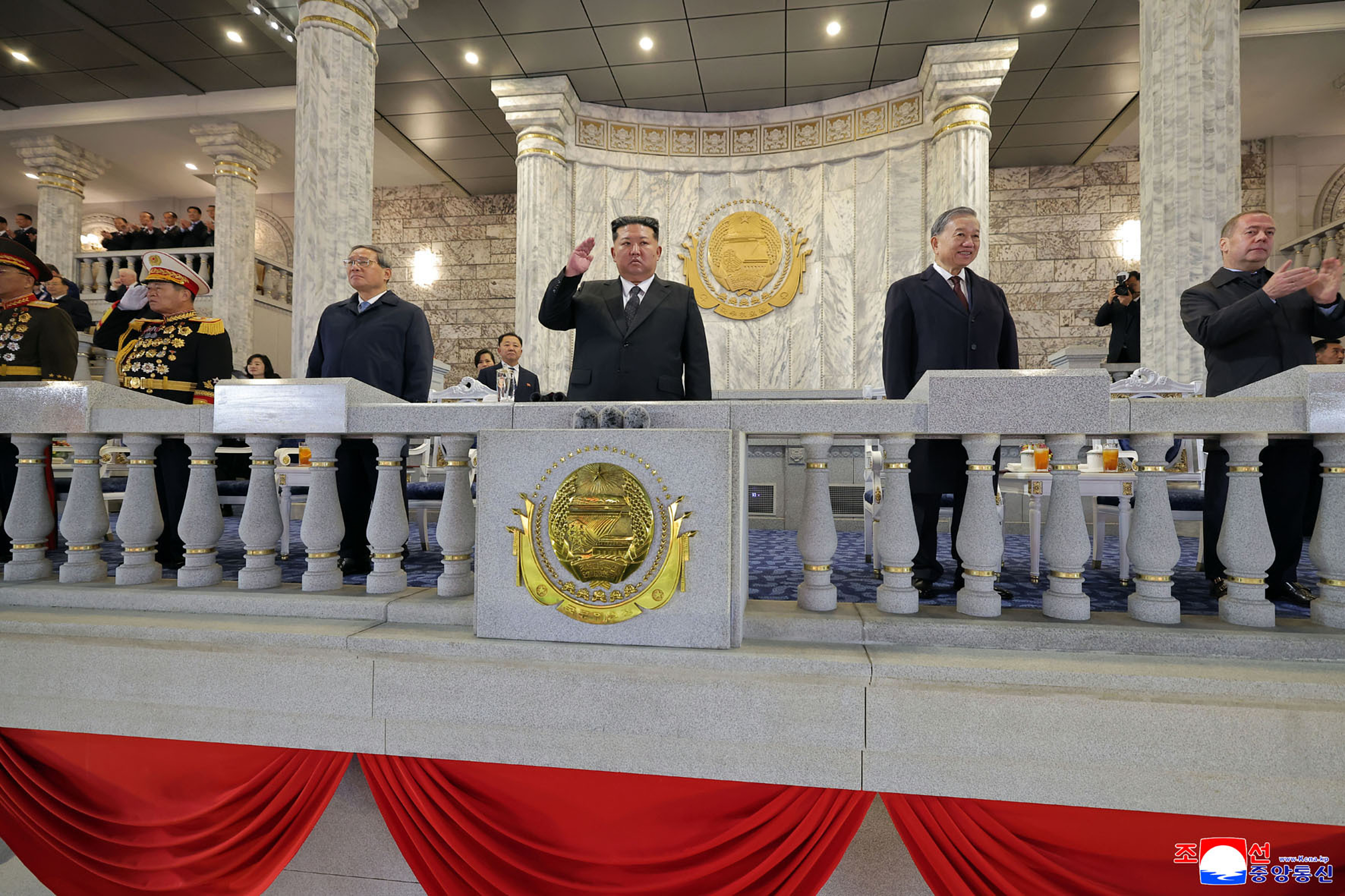 North Korean leader Kim Jong Un, Chinese Premier Li Qiang, Vietnamese Communist Party General Secretary To Lam and Russian Security Council Deputy Chairman Dmitry Medvedev attend the military parade in Pyongyang, North Korea, Friday.