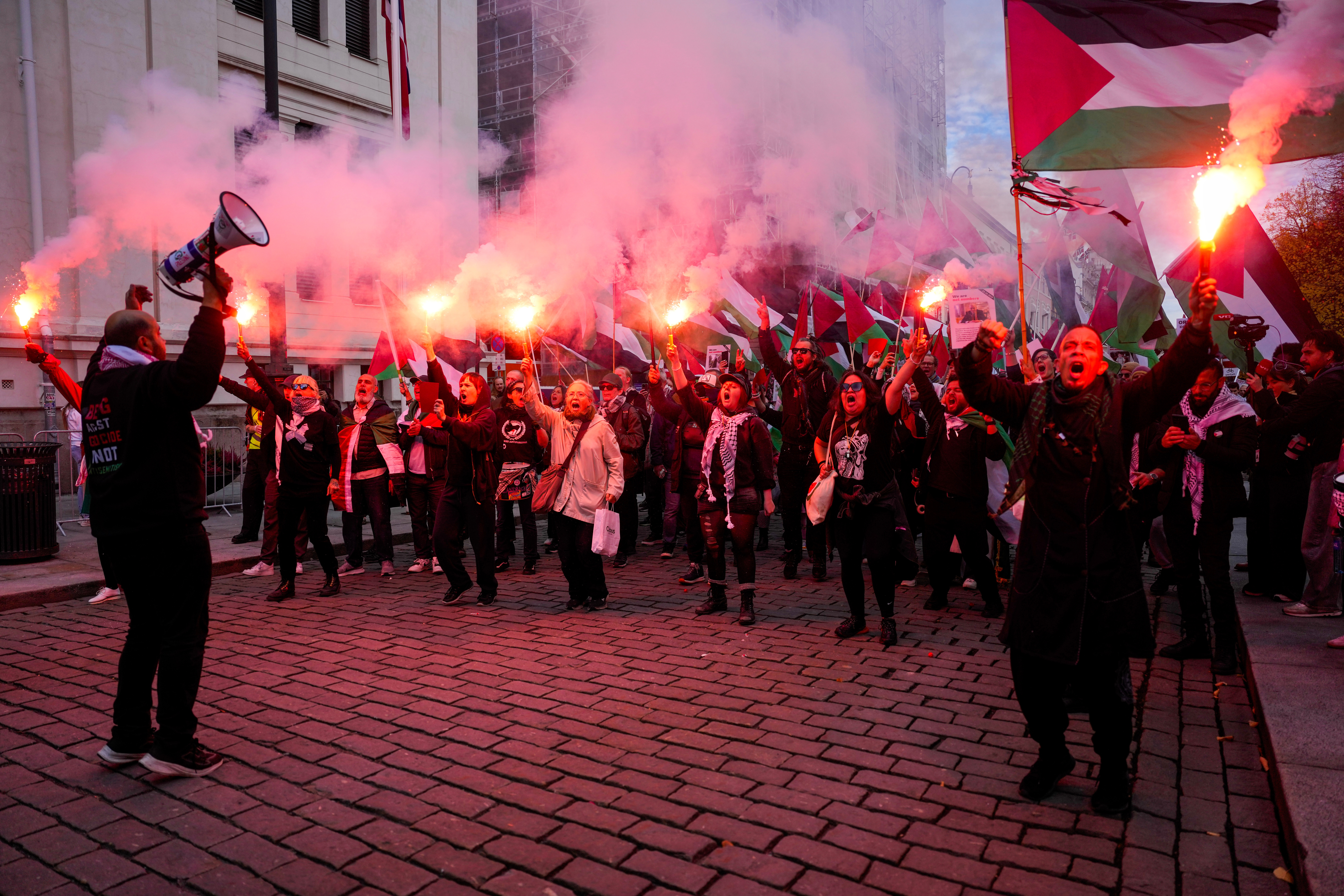 Pro-Palestinians protesters gather ahead of the World Cup qualifying soccer match between Norway and Israel in Oslo, Saturday, Oct. 11, 2025.
